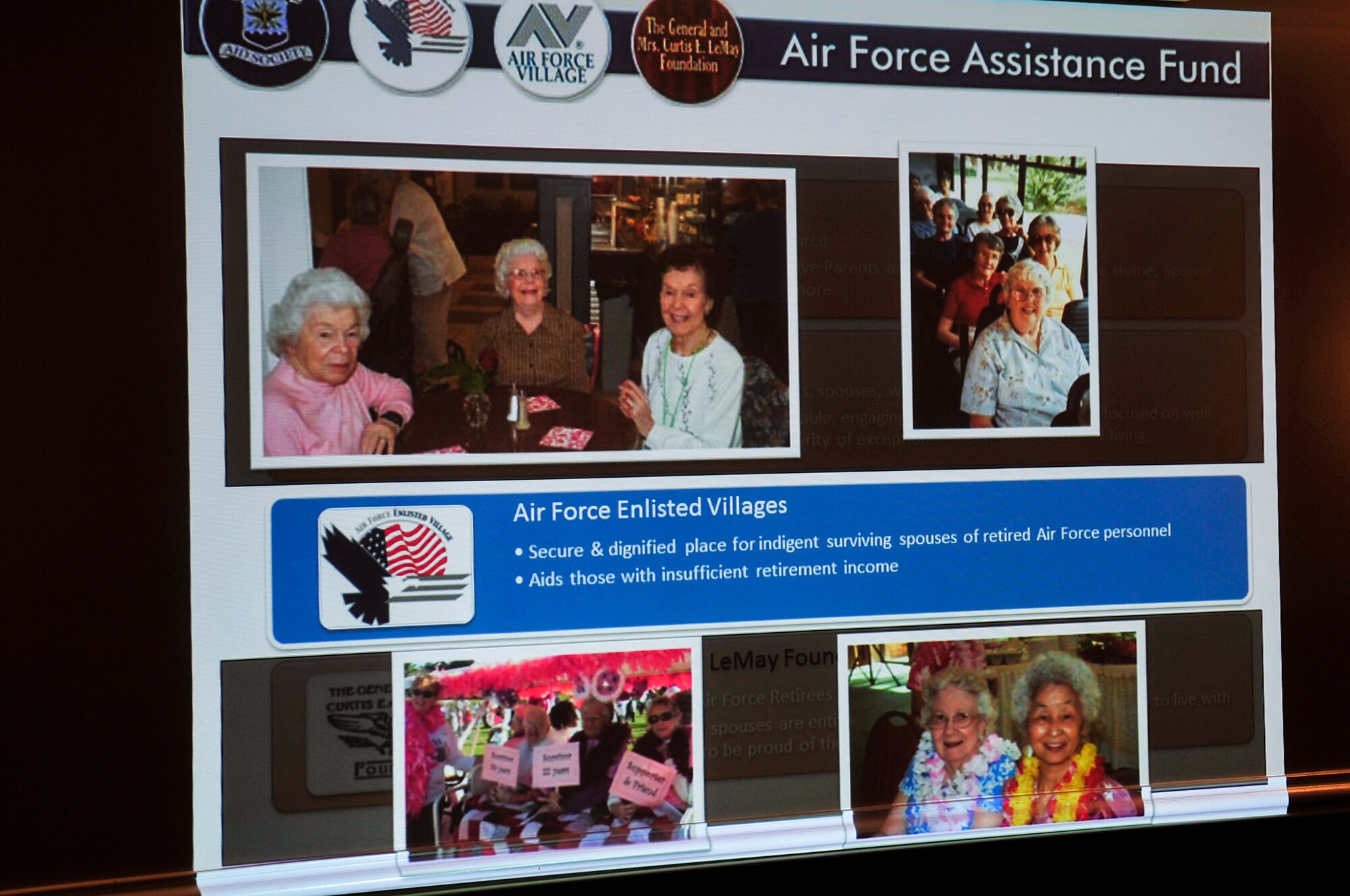 Information is displayed about the 2015 Air Force Assistance Fund during the annual kickoff breakfast, March 4, 2015, at Seymour Johnson Air Force Base, North Carolina. The AFAF drive will run until April 10, with a goal to raise $100,000. (U.S. Air Force photo/Airman Shawna L. Keyes)