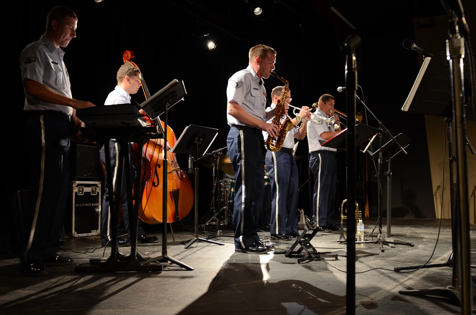 The Air Force Band of the Pacific’s Papana, from Joint Base Pearl Harbor Hickam, Hawaii, performs jazz ensembles at the University of Guam March 11, 2015. The Air Force Band of the Pacific’s Papana supports the U.S. Pacific command strategies of partnership, readiness and presence by conducting protocol, community and nation-building missions throughout the Pacific. (U.S. Air Force photo by Airman First Class Alexa Ann Henderson/Released)