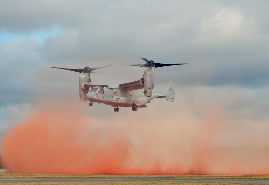 Pararescue Jumpers and Combat Rescue Officers, 920th Rescue Wing, Patrick AFB, FL, conduct joint training with a Marine Osprey tilt-rotor aircraft at the Guardian Center training facility March 11, 2015 in Perry, GA. This four-day exercise used HH-60 Pave Hawks and MV-22 Ospreys for simulated scenarios that included earthquake collapsed buildings, vehicle-borne improved explosive devices detonating, and mass casualty response. (U.S. Air Force photo/Staff Sgt. Kelly Goonan)