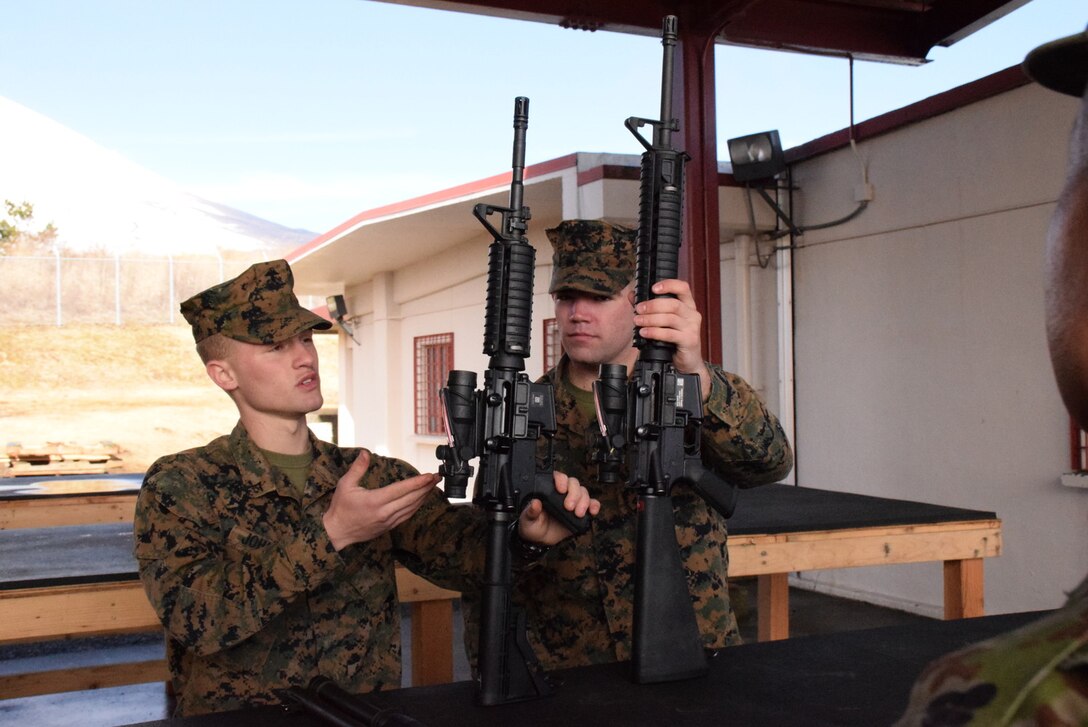 4 Mar 2015, Camp Fuji, Gotemba Japan (Photo by G5 Junko Akabane, Bilateral Engagement Coordinator, Co-Op Visit #75, JGSDF) - Students in the Bilateral Engagement Program of the US Army Japan visiting CATC Camp Fuji received a familiarization brief on weapons from the CATC Camp Fuji Armor, as well as briefs about Marine Corps tactical vehicles and equipment.  The Co-Op Group visits Camp Fuji 4 times a year to conduct language interaction training and enhance interoperability and overall inter-service awareness.