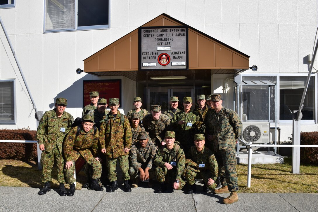 4 Mar 2015, Camp Fuji, Gotemba Japan (Photo by G5 Junko Akabane, Bilateral Engagement Coordinator, Co-Op Visit #75, JGSDF) - Students in the Bilateral Engagement Program of the US Army Japan visiting CATC Camp Fuji received a familiarization brief on weapons from the CATC Camp Fuji Armor, as well as briefs about Marine Corps tactical vehicles and equipment.  The Co-Op Group visits Camp Fuji 4 times a year to conduct language interaction training and enhance interoperability and overall inter-service awareness.