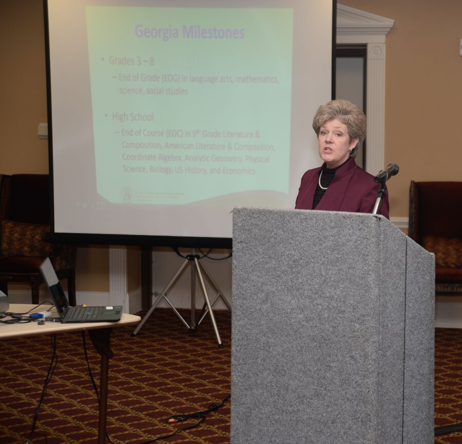 Renee Bridges, system test coordinator, Dougherty County School System, Albany, Georgia, explains many of the new Georgia Milestones Assessment System testing requirements to the installation’s parents attending the event, at Marine Corps Logistics Base Albany's Town and Country Ballroom, here, March 12. The Georgia Milestones Assessment System replaced the CRCT at the beginning of the 2014-2015 school year,” according to the Georgia Department of Education’s website: http://www.gadoe.org/Curriculum-Instruction-and-Assessment/Assessment/PAGES/CRCT.aspx