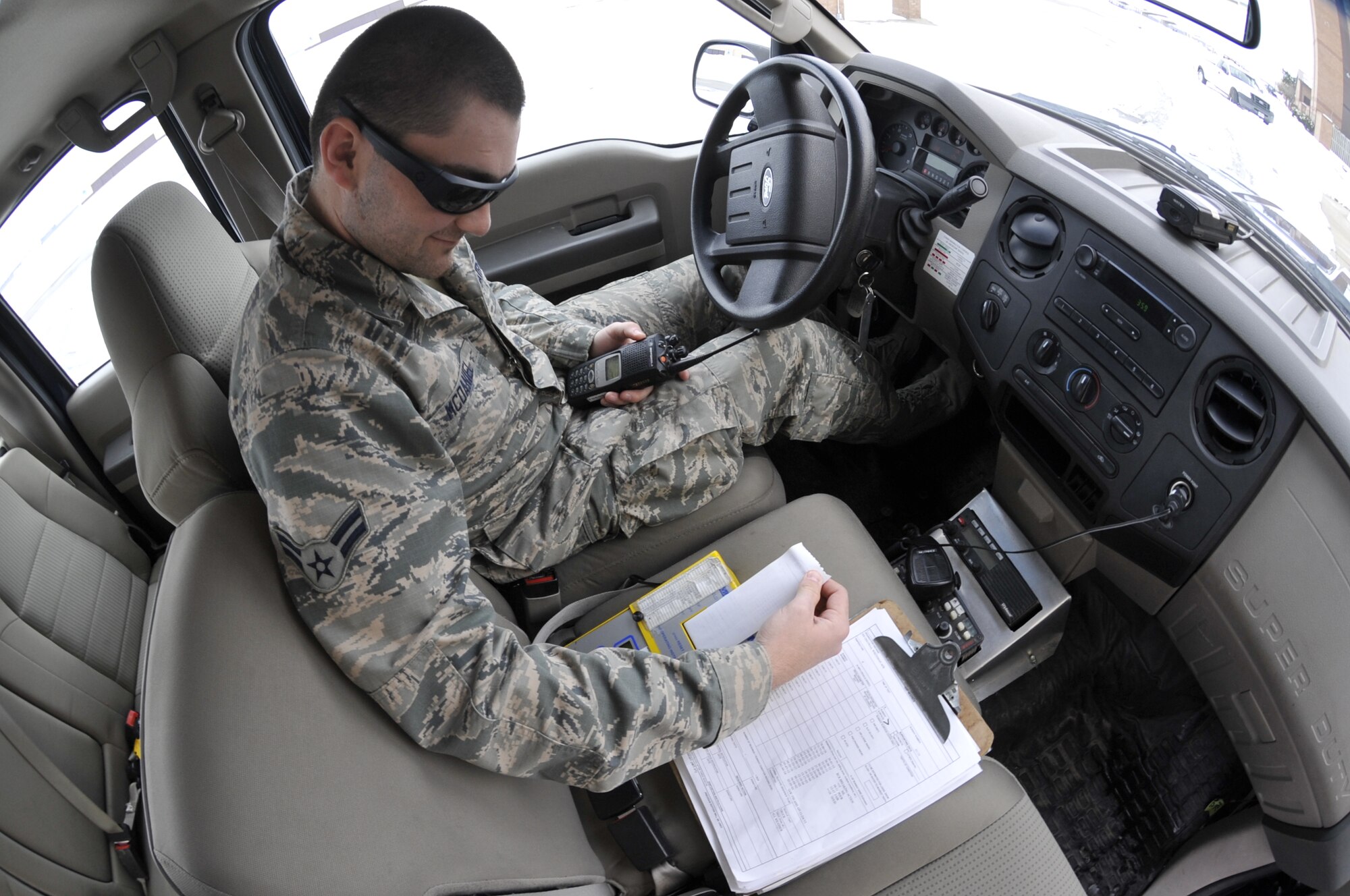 U.S. Air Force Airman 1st Class Zachary McDaniel, 509th Operations Support Squadron airfield management operations coordinator, examines decelerator results at Whiteman Air Force Base, Mo., Mar. 2, 2015. The decelerator is used to determine braking action based on how slick or dry the runways are. Once airfield management receives results, they are relayed to the pilots so they can determine the necessary braking action to use when taxiing. (U.S. Air Force photo by Senior Airman Keenan Berry/Released)
