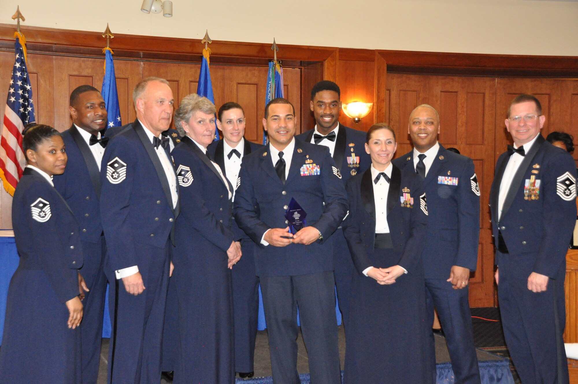 Staff Sgt. Robert McKinney, 459th Aerospace Medicine Squadron, wins the 459th First Sergeants Council's Diamond Sharp Award at the 459 ARW Annual Awards Banquet on Saturday, March 7, 2015. He is flanked by members of the 459th First Sergeants Council. (Air Force Photo / SrA Kristin Kurtz)
