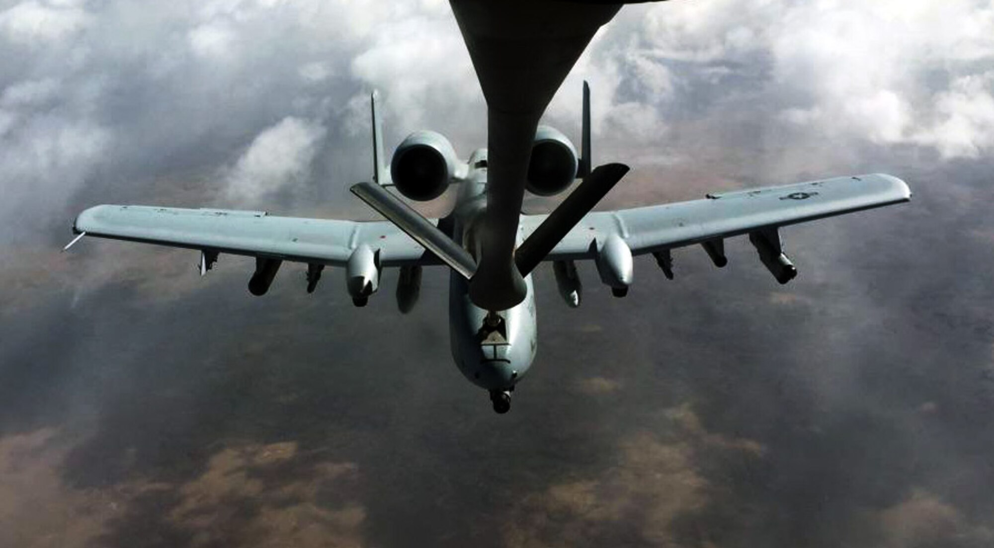 An A-10 Thunderbolt II aircraft assigned to the Air Force Reserve's 442nd Fighter Wing, Whiteman Air Force Base, Mo., is refueled by a KC-135 Stratotanker assigned to McConnell Air Force Base, Kan., March 13, 2015.  The KC-135 was operated by an aircrew made up of Reservists from the 931st Air Refueling Group at McConnell.  The two Reserve units were conducting an air refueling exercise to maintain air refueling currency and proficiency.  (U.S. Air Force photos by Senior Master Sgt. Ray Lewis)