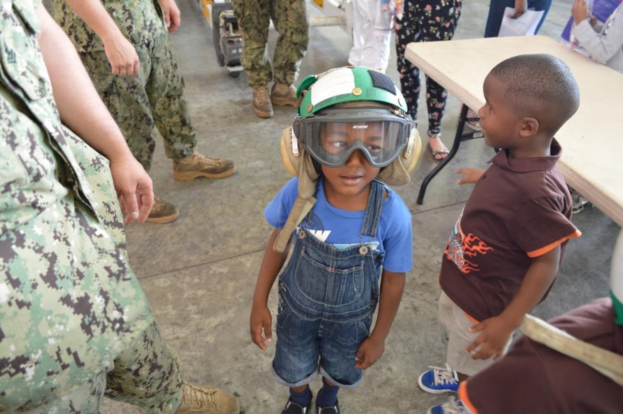 More than 100 children and staff from 11 different partner organizations were invited for an exclusive “Kid’s Day” tour of the U.S. Forward Operating Location (US FOL) in Curacao March 10, 2015. The participants were given a close view at the FOL’s capabilities in aircraft rescue and fire prevention, aircraft maintenance and sustainment, and airport safety and security.  This event was a combined effort involving 33 volunteer staff from the U.S. Air Force, U.S. Navy, and the HATO International Airport.  The U.S. FOL’s continued partnership with local organizations demonstrates their eagerness for community involvement and their long standing appreciation for the hospitality received from the citizens of Curacao. (Courtesy photo/released)