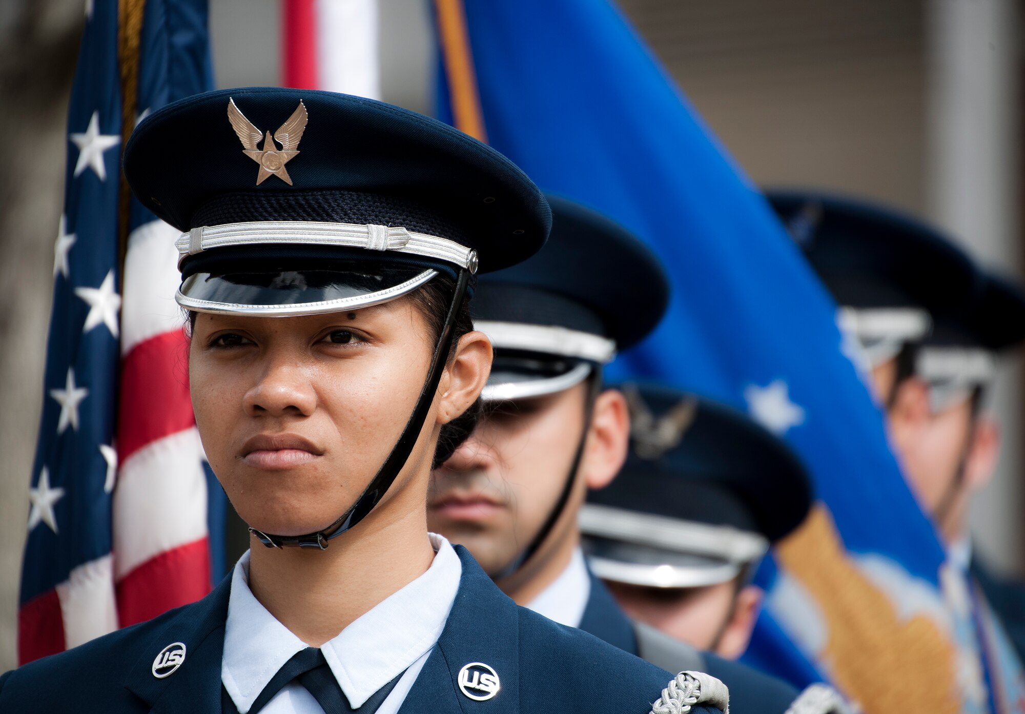 Senior Airman Hope Poialii, 96th Medical Services Squadron, leads the flag detail at the Honor Guard graduation ceremony March 4 at Eglin Air Force Base, Fla. Approximately 12 new Airmen graduated from the 80-plus-hour course. The graduation performance includes flag detail, rifle volley, pall bearers and bugler for friends, family and unit commanders. (U.S. Air Force photo/Samuel King Jr.)