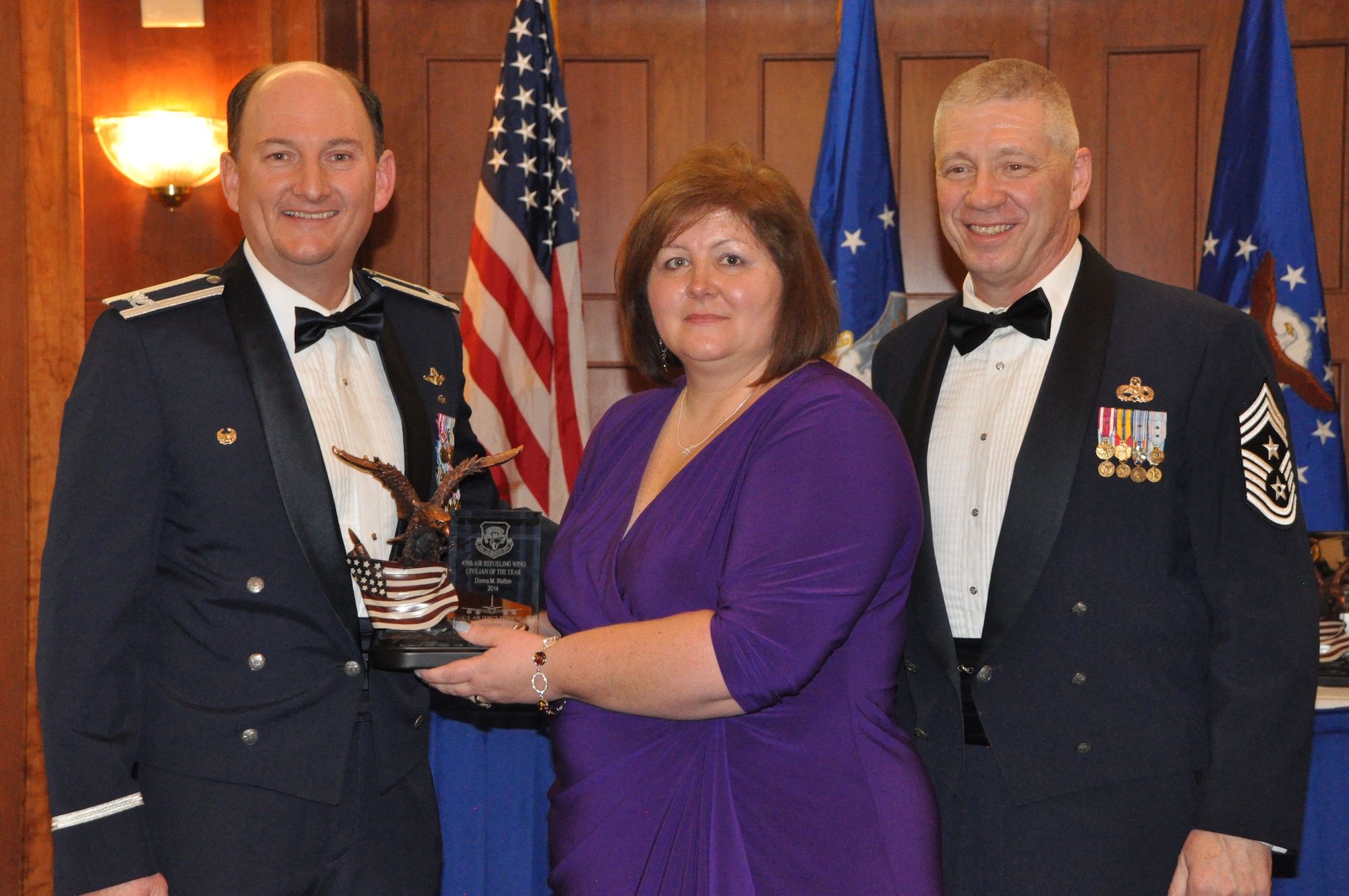 Ms. Donna Walton, 756th Air Refueling Squadron, wins the Civilian of the Year award at the 459 ARW Annual Awards Banquet on Saturday, March 7, 2015. (Air Force Photo / SrA Kristin Kurtz)