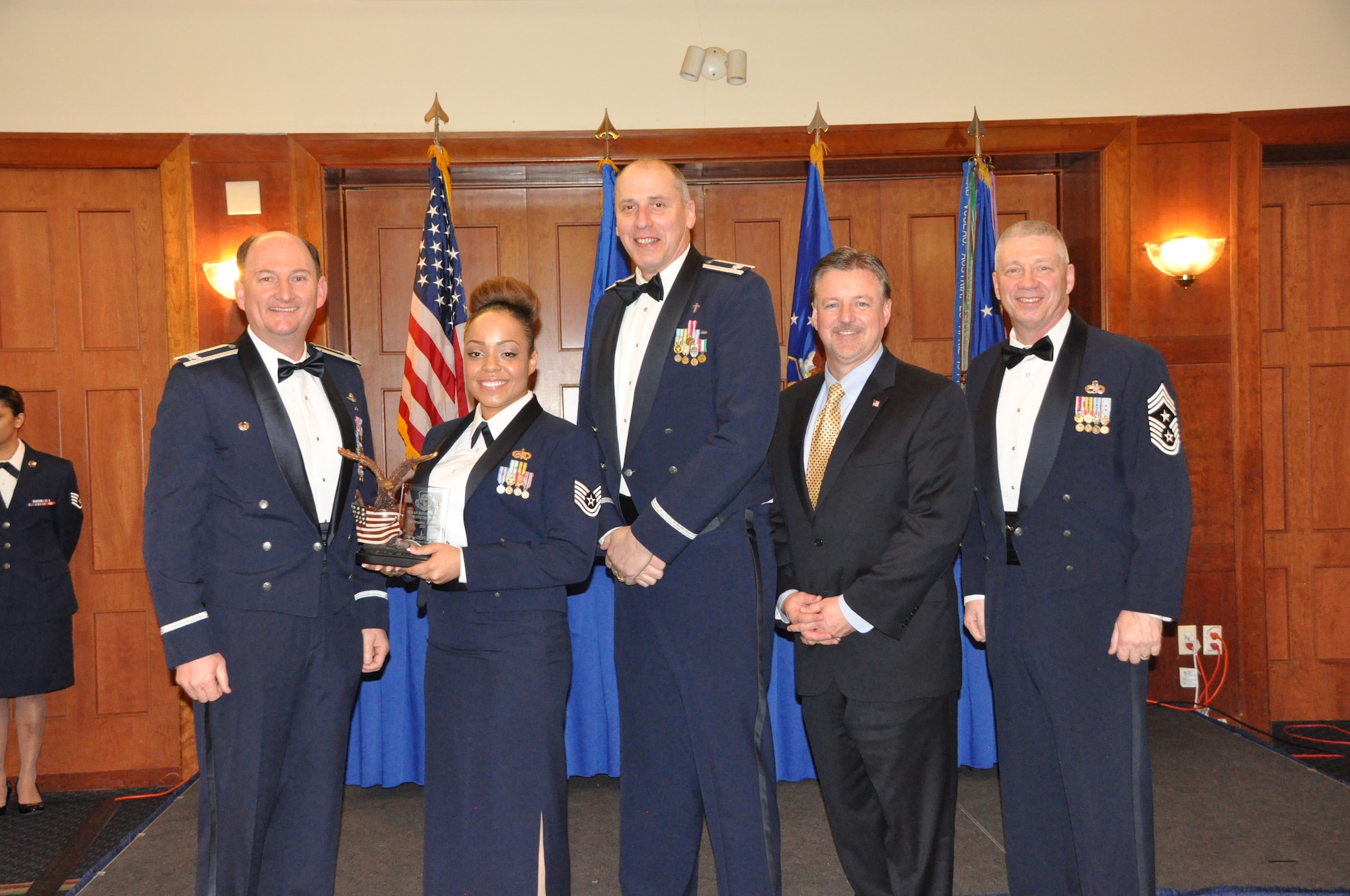 Technical Sgt. Shakia Johnson, 459th Logistics Readiness Squadron, wins the Non-Commissioned Officer of the Year award at the 459 ARW Annual Awards Banquet on Saturday, March 7, 2015. (Air Force Photo / SrA Kristin Kurtz)