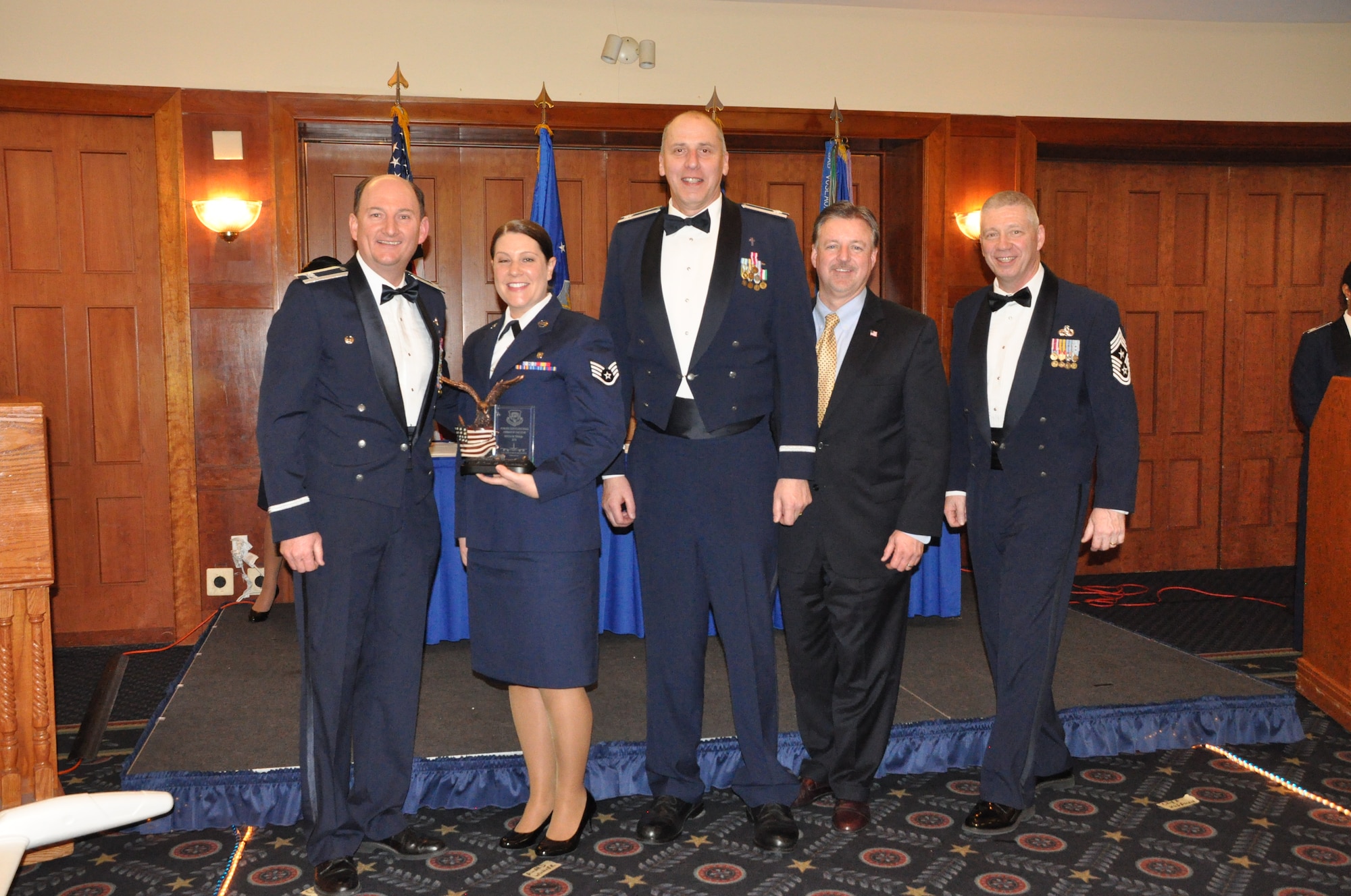 Staff Sgt. Erin Flerlage wins the Airman of the Year award at the 459 ARW Annual Awards Banquet on Saturday, March 7, 2015. (Air Force Photo / SrA Kristin Kurtz)