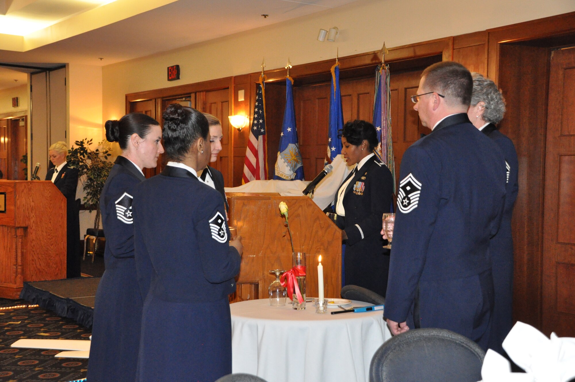 First Sergeants from the 459th Air Refueling Wing circle the ceremonial POW/MIA table to conduct the honors at the 459 ARW Annual Awards Banquet on Saturday, March 7, 2015. (Air Force Photo / SrA Kristin Kurtz)