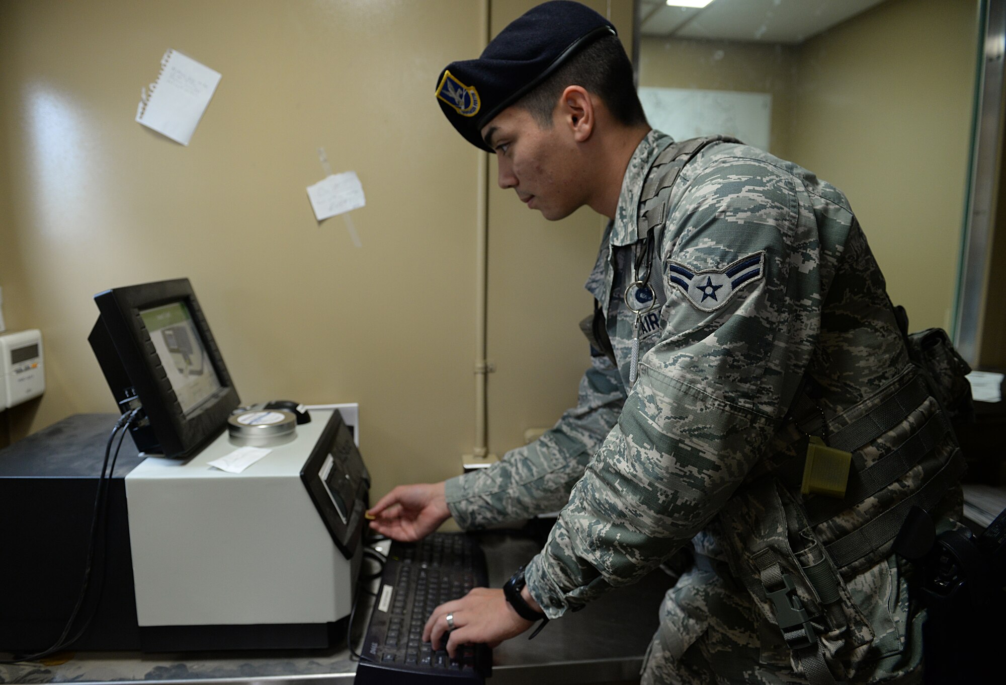 Airman 1st Class Scott Wilmot, 81st Security Forces Squadron commercial vehicle entry controller, uses explosive detection equipment to test for traces of explosives on vehicles entering the installation at the commercial vehicle entrance March 12, 2015, Keesler Air Force Base, Miss. 81st SFS Airmen perform multiple roles to keep members of Keesler safe, ranging from identification checks at base entrances to searching for explosives and narcotics with military working dogs. (U.S. Air Force photo by Senior Airman Holly Mansfield)