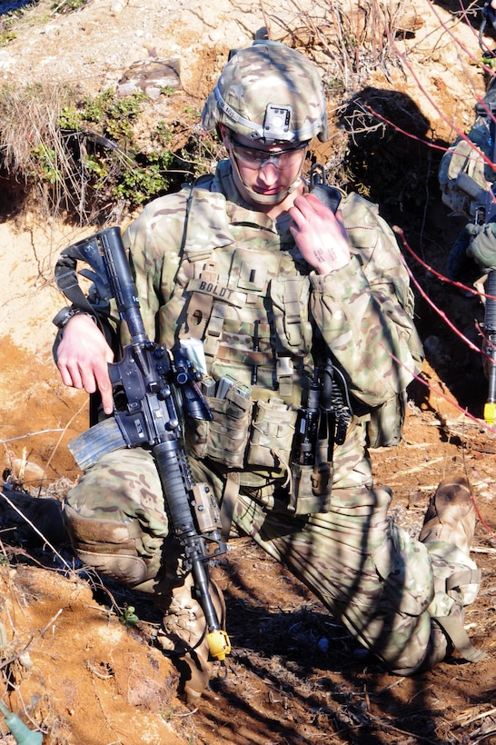 U.S. Army 1st Lt. Christopher M. Boldt calls in a report during a combined situational exercise with Estonian soldiers as part of Operation Atlantic Resolve in Tapa, Estonia, March 13, 2015. Boldt is a platoon leader assigned to 3rd Squadron, 2nd Cavalry Regiment.
