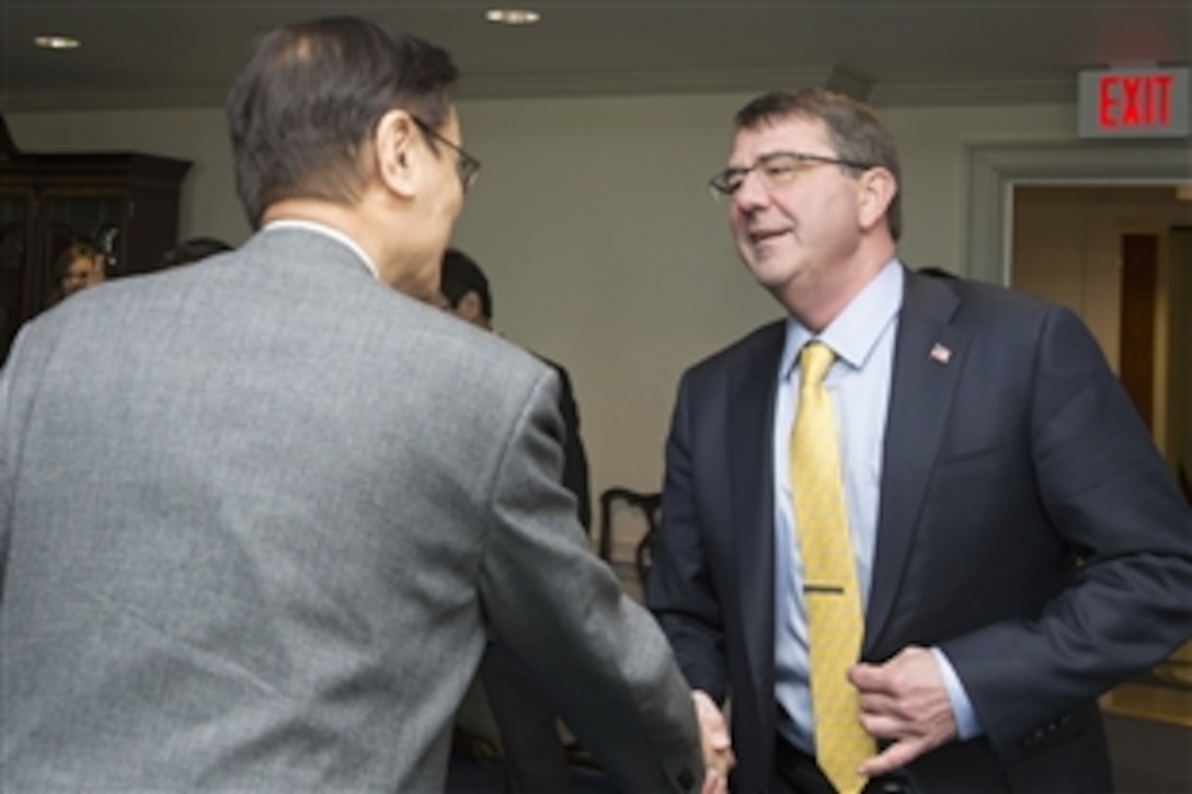U.S. Defense Secretary Ash Carter, right, meets with Japanese National Security Advisor Shotaro Yachi at the Pentagon, March 16, 2015. The two defense leaders met to discuss matters of mutual importance.