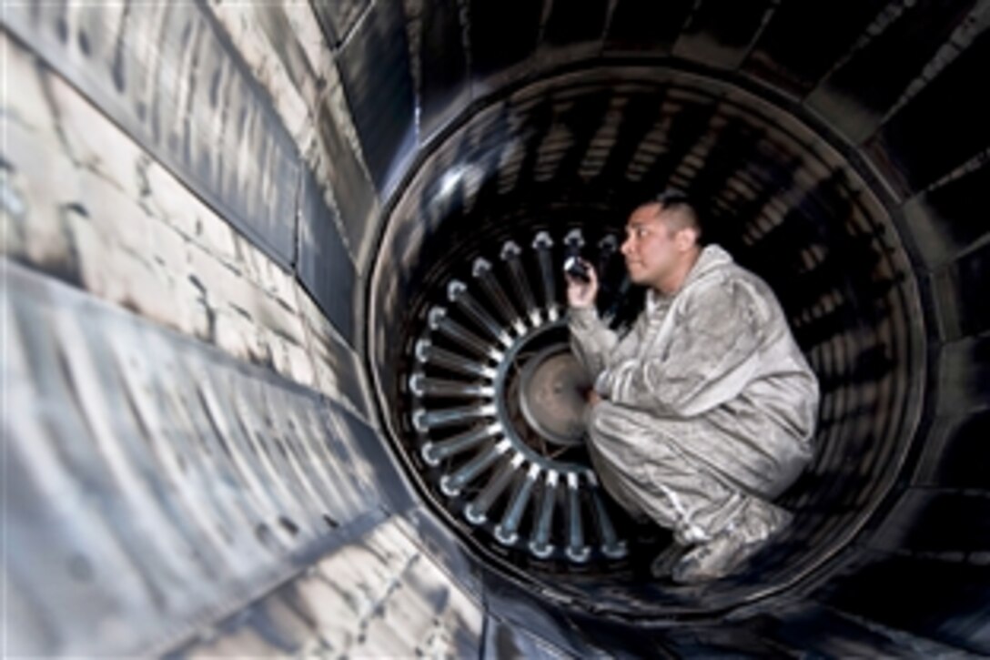 Air Force Staff Sgt. Esteban Ramirez inspects the exhaust on a B-1B Lancer aircraft during exercise Red Flag 15-2 on Nellis Air Force Base, Nev., March 10, 2015. Ramirez is an aerospace propulsion technician assigned to the 28th Aircraft Maintenance Squadron.