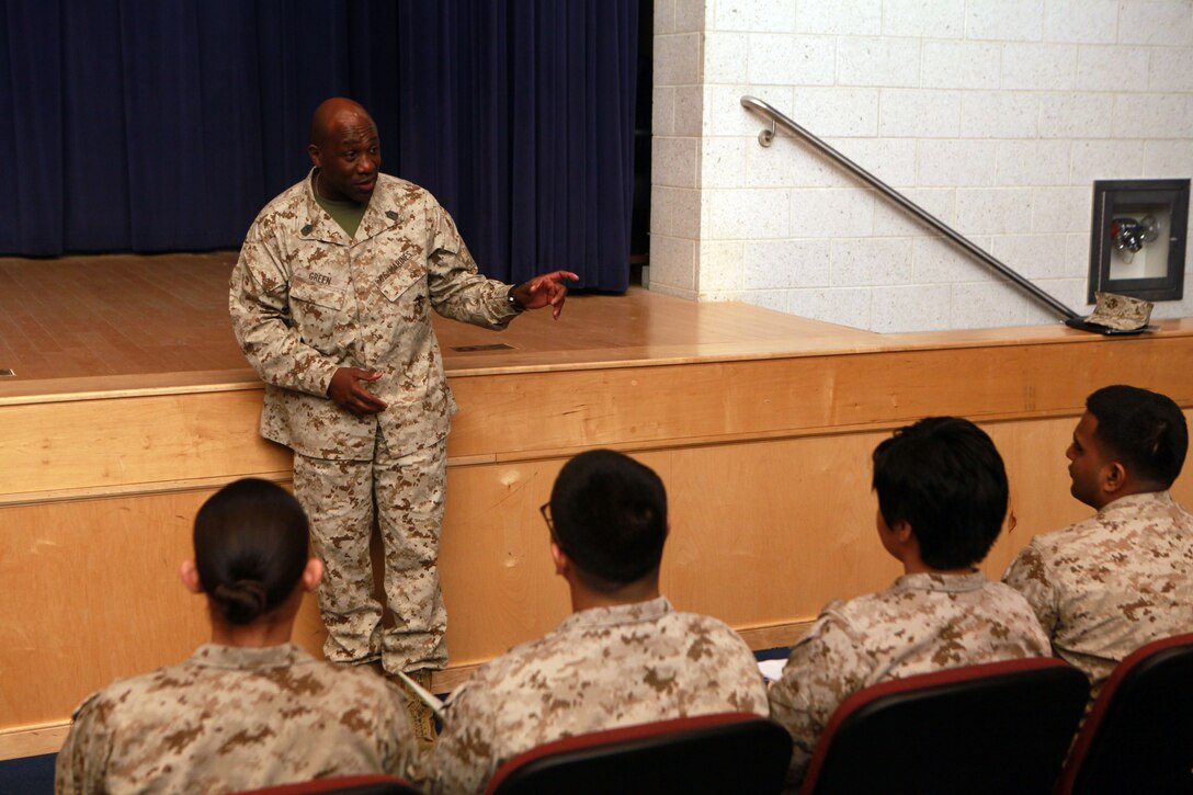 Sgt. Maj. Ronald L. Green, the 18th Sergeant Major of the Marine Corps, addresses Marines assigned to Henderson Hall in the Joe Rosenthal Theater at Joint Base Myer-Henderson Hall, Va., March 11, 2015. (U.S. Marine Corps photo by Sgt. Marionne T. Mangrum) 