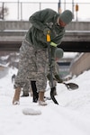 Soldiers attached to G Company, 186nd Brigade Support Battalion, continued supporting the Massachusetts Bay Transportation Authority in snow removal operations Feb. 19, 2015. Over the course of the day, over 40 Soldiers cleaned portions of the tracks that were inaccessible to machines by hand with picks, shovels and brooms. This essential work accelerated the restoration of Red Line train line service, which according to MBTA officials, can see up to 250,000 passengers a day. 
