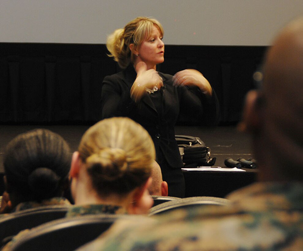 Dr. Tracy Hejmanowski, psychologist, Naval Hospital Jacksonville, Fla., gives an overview of combat and operational stress symptoms to Marines and Sailors aboard Marine Corps Logistics Base Albany, recently. 