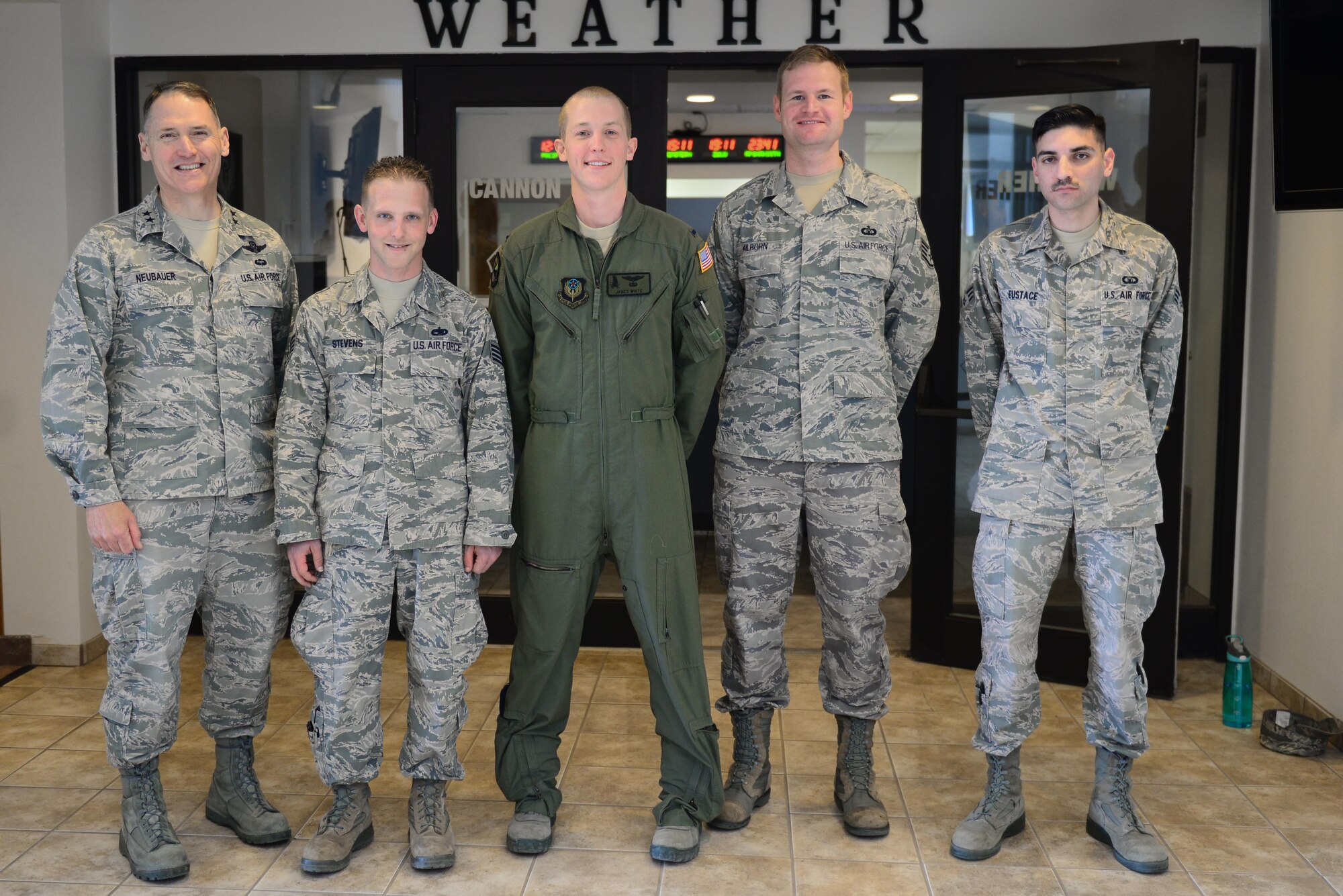U.S. Air Force Maj. Gen. Kurt Neubauer, Air Force Safety Chief, poses with Staff Sgt. John Stevens, 27th Special Operations Aircraft Maintenance Squadron gunship support section supervisor, 1st Lt. James White, 318th Special Operations Squadron pilot, Staff Sgt. Nathan Kilborn, 27th Special Operations Support Squadron tower watch supervisor, and Senior Airman Justin Eustace, 27th SOSS tower air traffic controller, March 12, 2015 at Cannon Air Force Base, N.M. Neubauer visited Cannon to congratulate the base for its role in securing Air Force Special Operations Command’s second consecutive award for the Air Force’s best flight safety program. (U.S. Air Force photo/Airman 1st Class Shelby Kay-Fantozzi)  