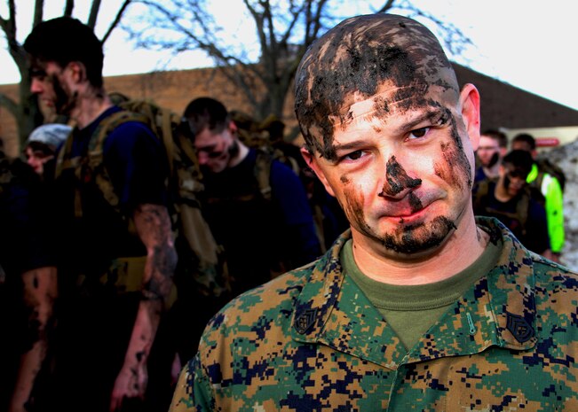 Gunnery Sgt. Michael Wulf, staff-noncommissioned officer in charge of Recruiting Substation Aurora, puts his Marine-applicant’s endurance to the test with a pack run through rugged terrain during an all-hands event, March 14. The applicants are a part of the Marine Corps’ Delayed Entry Program and are currently scheduled and preparing to ship to recruit training.