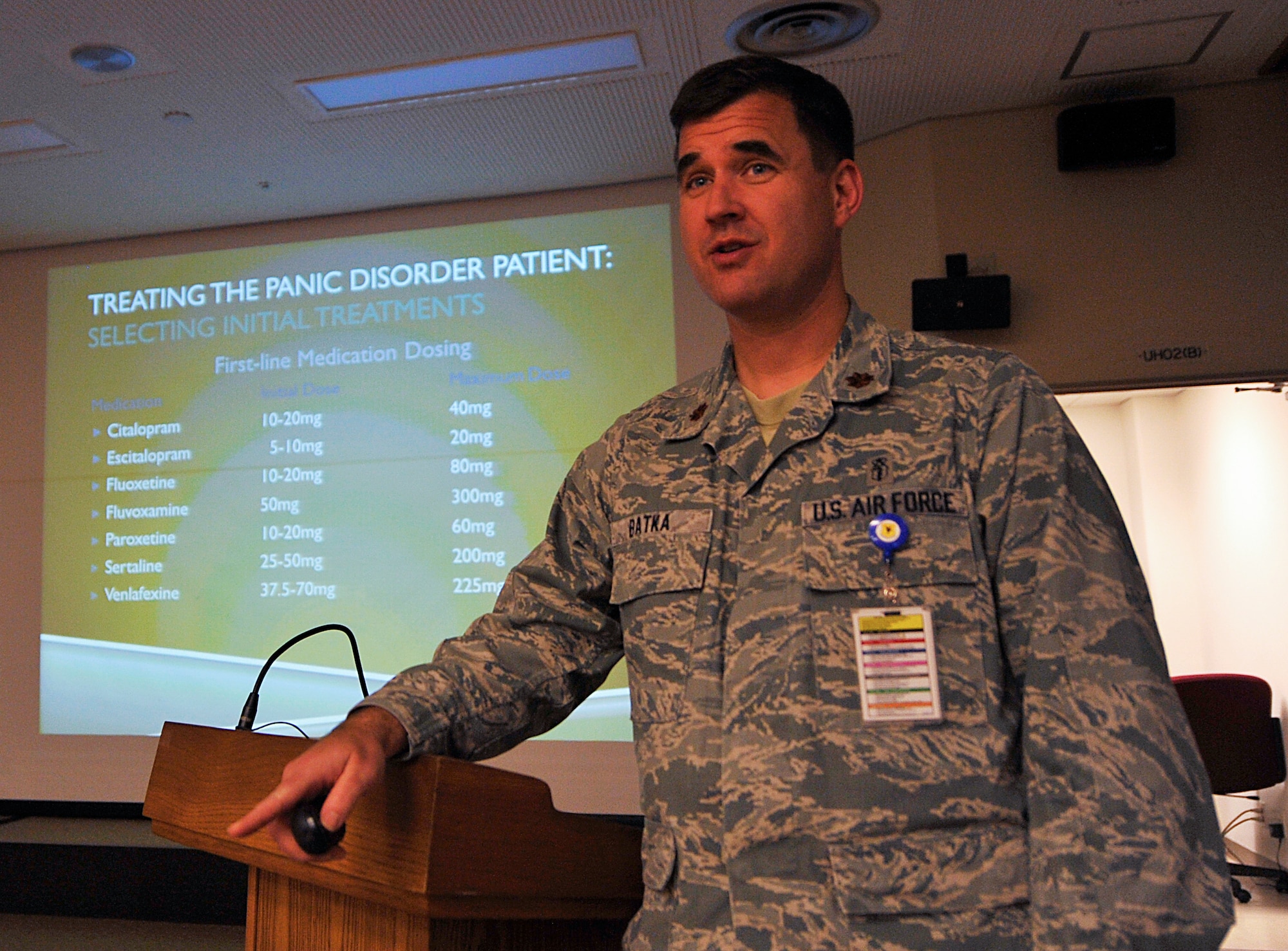 U.S. Air Force Maj. John Batka, 18th Medical Operations Squadron flight commander, briefs about treating panic disorders during the National Patient Safety Awareness Week on Kadena Air Base, Japan, March 11, 2015. The Patient Safety Awareness Week was held March 9 through 13 at the 18th Medical Group, in conjunction with the National Patient Safety Foundation. Patient Safety Awareness Week is an annual education and awareness campaign for health care safety led by the National Patient Safety Foundation. (U.S. Air Force photo by Naoto Anazawa)
