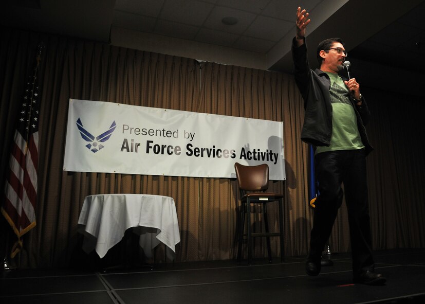 Danny Villalpando, comedian, greets Grand Forks Air Force Base, N.D., during the Comics on Duty Tour on March 13, 2015. Approximately 200 base personnel attended the comedy performance by Villalpando, Gary Brightwell, Graham Elwood and Paul Ogata. (U.S. Air Force photo/Senior Airman Xavier Navarro)
