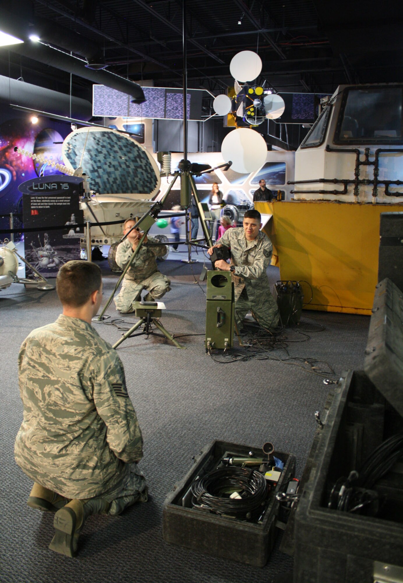 COLORADO SPRINGS, Colo. – Tech. Sgt. Jason Daughtrey, 21st Operations Support Squadron Weather Flight (front), coordinates set up of the TMQ 53 Tactical Meteorological Observing System with Staff Sgt. Randy Meese and Capt. Adam King, also from the 21st OSS. The team was participating in the Space Foundation Star Days event March 7. (Courtesy photo)