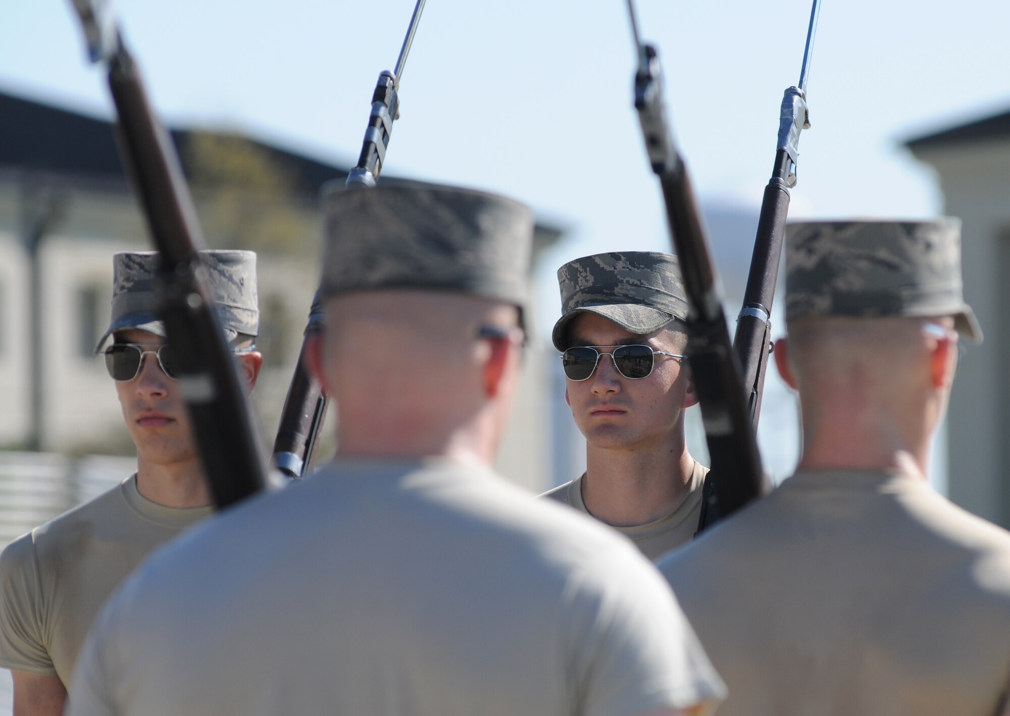 The U.S. Air Force Honor Guard Drill Team practices a new routine at the Levitow Training Support Facility Drill Pad March 16, 2015, at Keesler Air Force Base, Miss.  The drill team began developing their new routine here Feb. 21 and will conduct practice through the end of March.  They will unveil the new routine at the upcoming Keesler Air Show/Open House March 28 at 9 a.m.  (U.S. Air Force photo by Kemberly Groue)