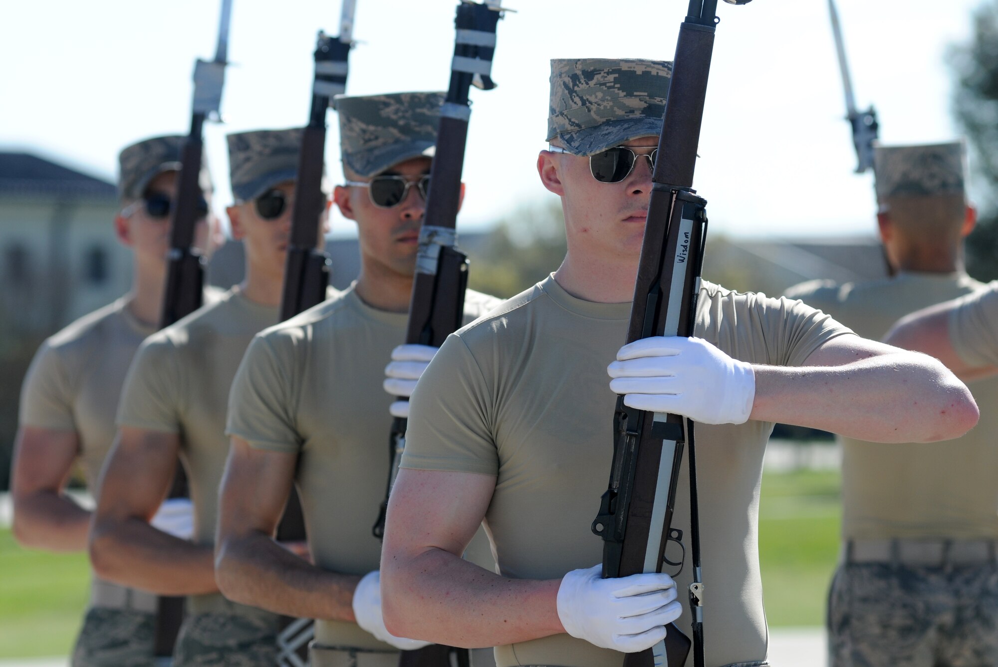 The U.S. Air Force Honor Guard Drill Team practices a new routine at the Levitow Training Support Facility Drill Pad March 16, 2015, at Keesler Air Force Base, Miss.  The drill team began developing their new routine here Feb. 21 and will conduct practice through the end of March.  They will unveil the new routine at the upcoming Keesler Air Show/Open House March 28 at 9 a.m.  (U.S. Air Force photo by Kemberly Groue)