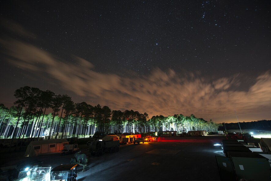 Airmen from the 824th Base Defense Squadron set up a forward operating base during a mission readiness exercise March 10, 2015, at Camp Blanding, Fla. The squadron continuously operates 24 hours a day to ensure the FOB remains secure. (U.S. Air Force Photo by Senior Airman Ryan Callaghan/Released)