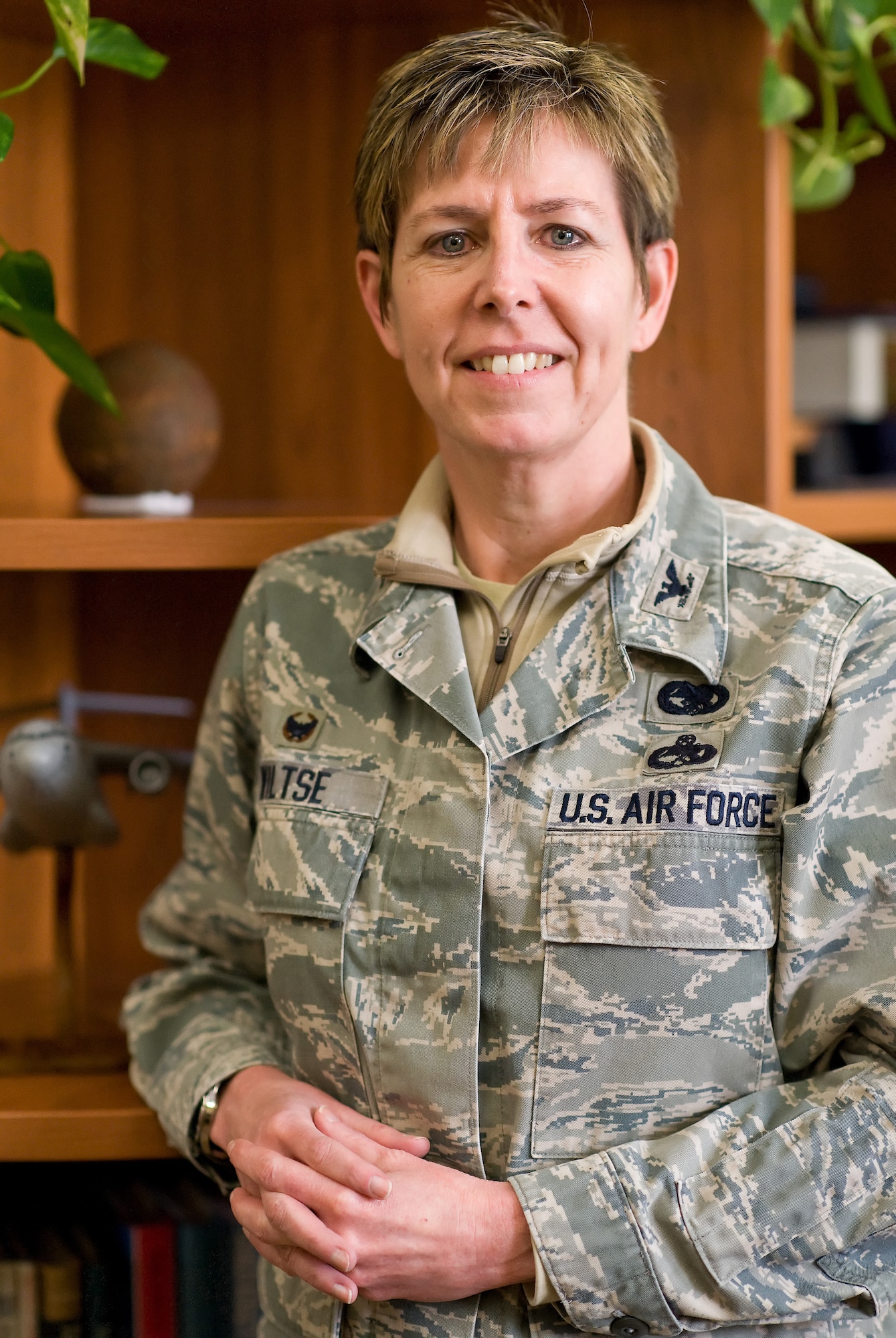 Col. Gretchen Wiltse, 512th Mission Support Group commander, 512th Airlift Wing, an associate Air Force Reserve Command unit, takes a moment for a photo outside her office Feb. 26, 2015, on Dover Air Force Base, Del. Wiltse is the senior officer responsible for the 800-person organization, which supports Air Mobility Command's worldwide airlift mission, operating C-5 and C-17 aircraft. (U.S. Air Force photo/Roland Balik)