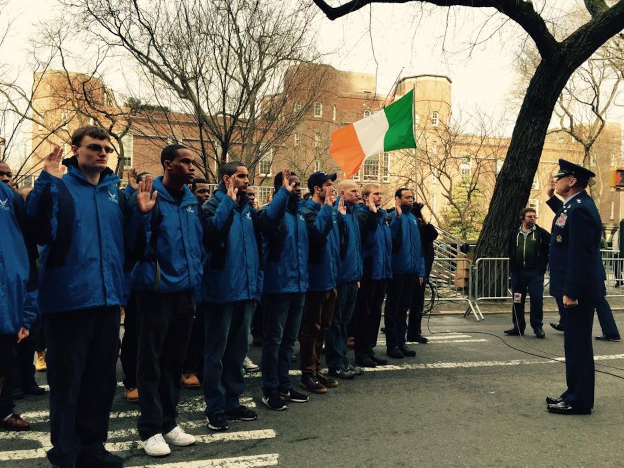 Air Force District of Washington Commander Maj. Gen. Darryl Burke administers the Oath of Enlistment to a group of future Airmen in the Delayed Entry Program at the St Patrick's Day Parade in New York City March 17, 2015. (U.S. Air Force photo)