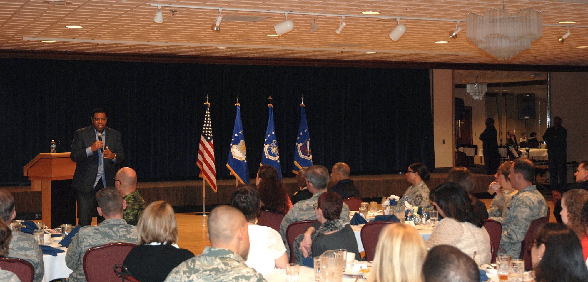 PETERSON AIR FORCE BASE, Colo. -- Chip Simmons, founder and president of After the Game  Ministries and chaplain for the Denver Broncos, talks about how prayer brings peace during times of transition. Simmons was the featured speaker for the National Prayer Luncheon March 11 at The Club. (U.S. Air Force photo by Dave Smith)