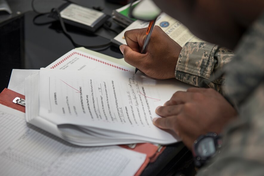 U.S. Air Force Airman Treyton-Thomas Juopperi, 364th Training Squadron student, works on a class assignment at Sheppard Air Force Base, Texas, March 16, 2015. During this class Airmen learn a basic understanding of how to identify aircraft discrepancies and what to do to fix them. (U.S. Air Force photo by Senior Airman Kyle Gese)