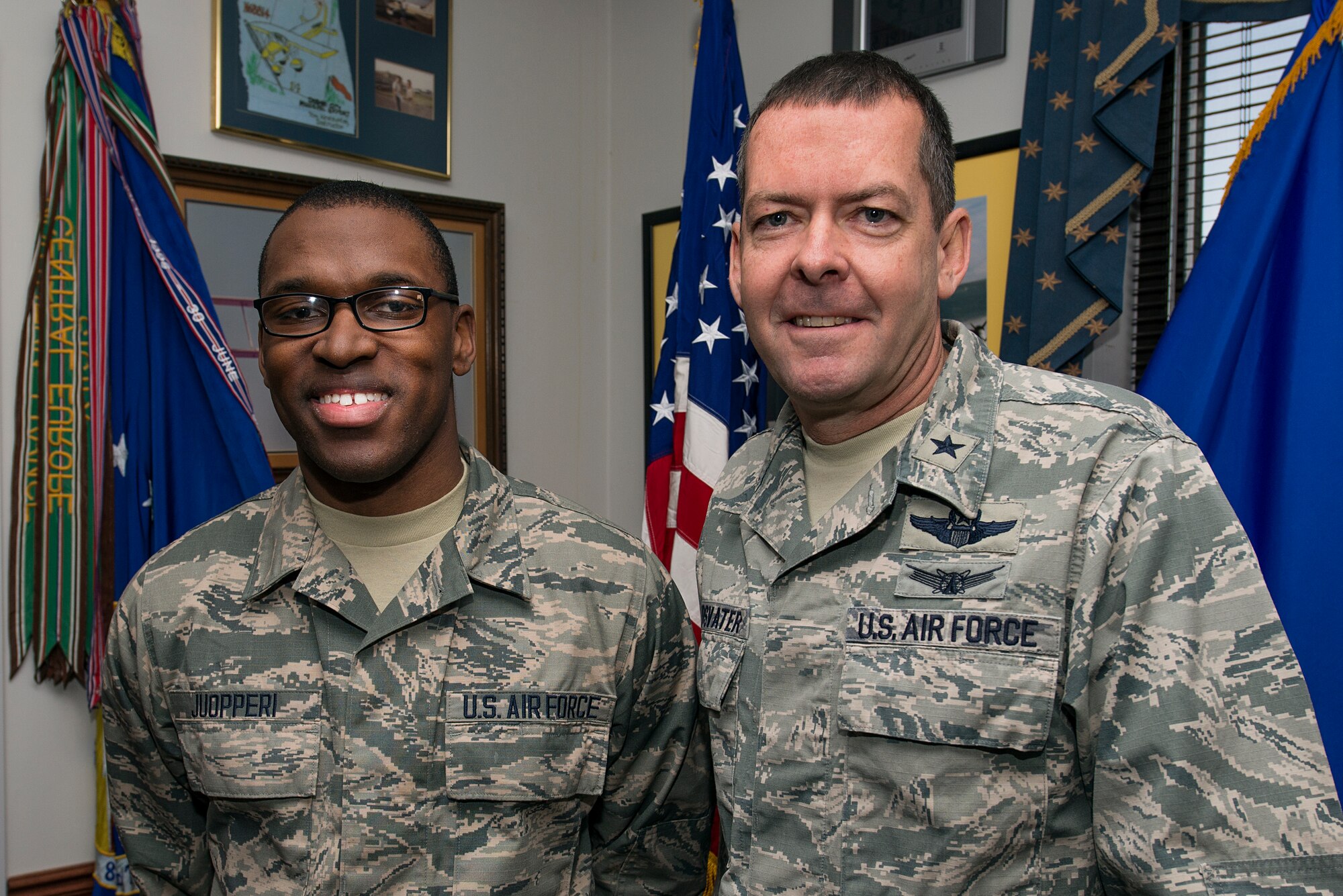 U.S. Air Force Brig. Gen. Scott Kindsvater, 82nd Training Wing commander, and U.S. Air Force Airman Treyton-Thomas Joupperi, 364th Training Squadron student, stand together after Joupperi’s speech at Sheppard Air Force Base, Texas, Feb. 19, 2015. After Kindsvater learned of his mother’s ultimate sacrifice Joupperi was invited to share his story with the rest of the wing leadership. (U.S. Air Force photo by Senior Airman Kyle Gese)