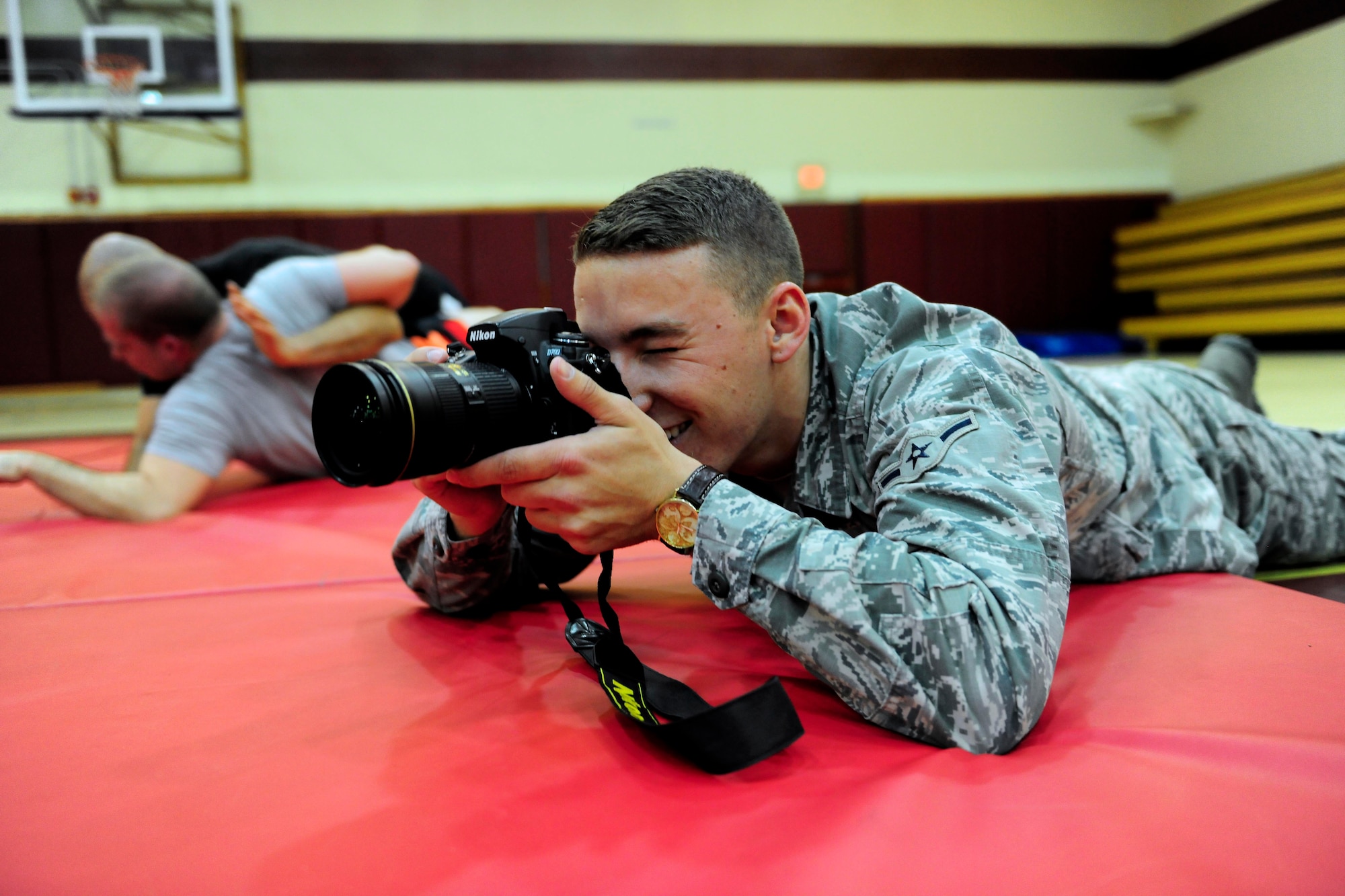 Airman Cory W. Bush, 39th Air Base Wing Public Affairs photojournalist apprentice, provides photo coverage during an event Feb. 27, 2015, at Incirlik Air Base, Turkey. Bush placed 3rd and 2nd in the 2014 U. S. Air Forces in Europe - U.S. Air Forces in Africa Media Contest categories for outstanding new photographer and new feature photo. (U.S. Air Force photo by Senior Airman Krystal Ardrey/Released)