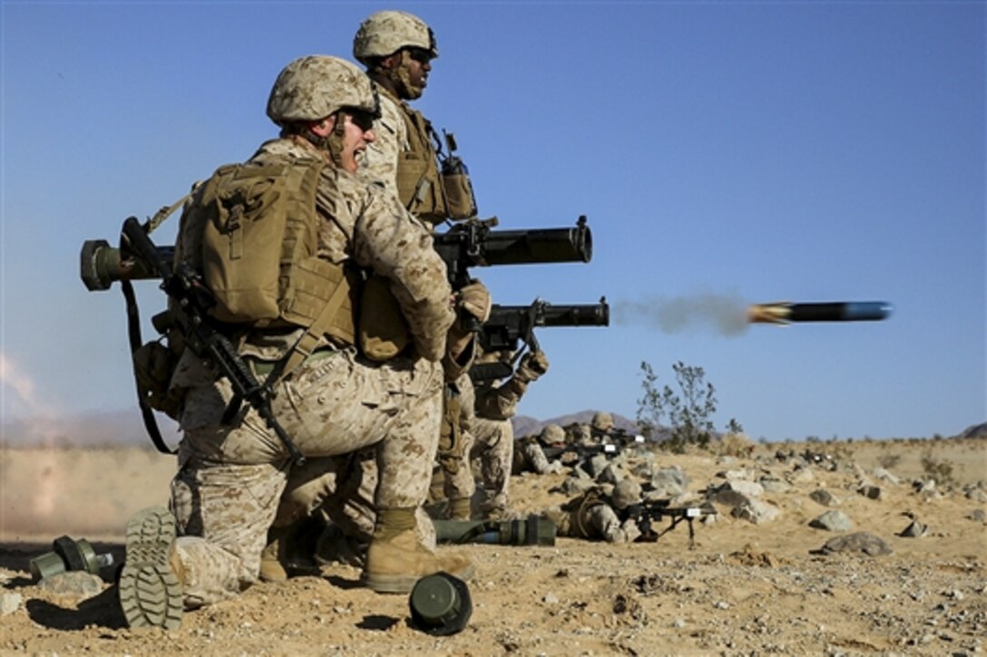 Marines fire an MK153 shoulder-launched assault weapon during an operational test and evaluation activity on Marine Corps Air Ground Combat Center Twentynine Palms, Calif., March 7, 2015. The Marines are antitank missileman assigned to Weapons Company, Ground Combat Element Integrated Task Force.