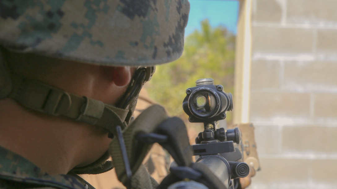 Lance Cpl. Miguel Ruiz, a rifleman with 3rd Battalion, 8th Marine Regiment, watches for enemy role players during a military-operations-on-urban-terrain training exercise aboard Camp Lejeune, N.C., March 11, 2015. Battles such as the siege of Stalingrad and Hue City thrust troops into vicious street-to-street battles without previous training for urban environments, which led to the creation of modern-day MOUT training.