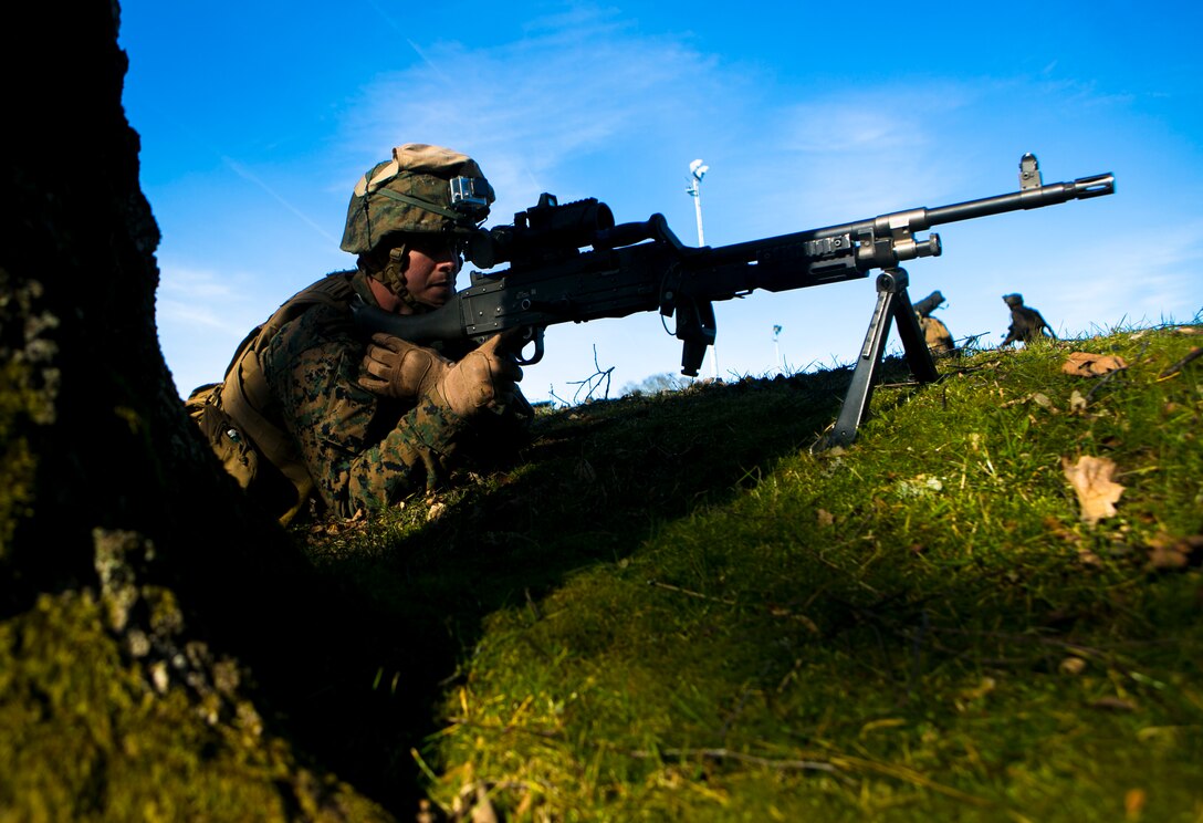A Marine with Special-Purpose Marine Air-Ground Task Force Crisis Response-Africa, provides security during a mock assault with U.S. Army Special Forces in Baumholder, Germany, March 11, 2015.  The Marines established a cordon around a block of buildings, clearing the way for a precision assault by Special Forces personnel. (U.S. Marine Corps photo by Sgt. Paul Peterson/Released)