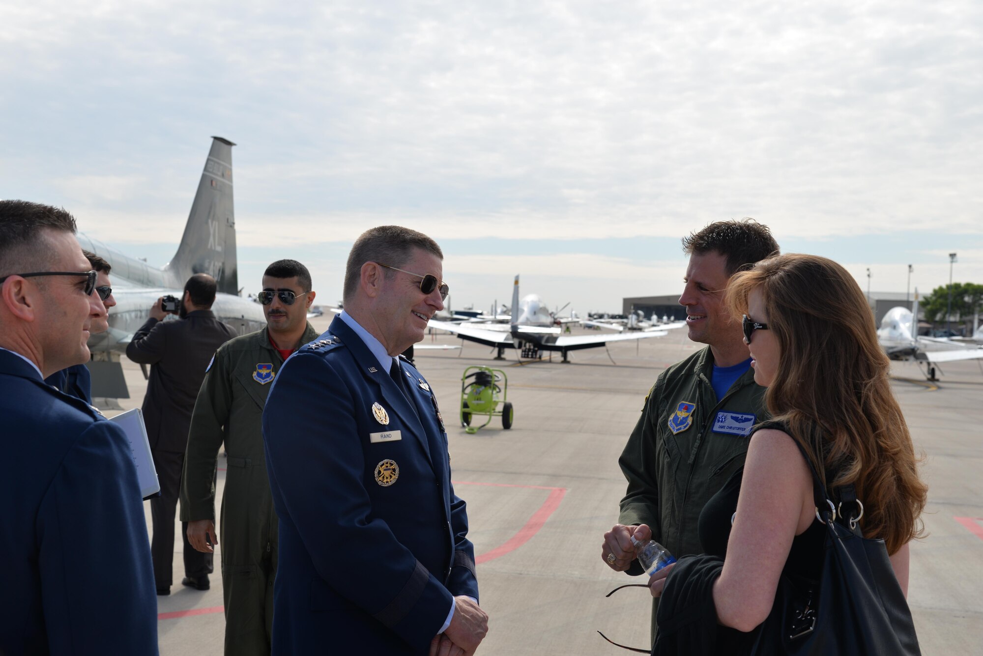 Gen. Robin Rand, commander of Air Education and Training Command, joins Laughlin members to celebrate SUPT Class 15-06 graduation on Laughlin Air Force Base, Texas, March 13, 2015. Rand spoke at the graduation ceremony and thanked all the friends, family and Team XL members for their support and encouraged the new pilots to remain committed to the Air Force. (U.S. Air Force photo by 2nd Lt. Aaron Redfield)