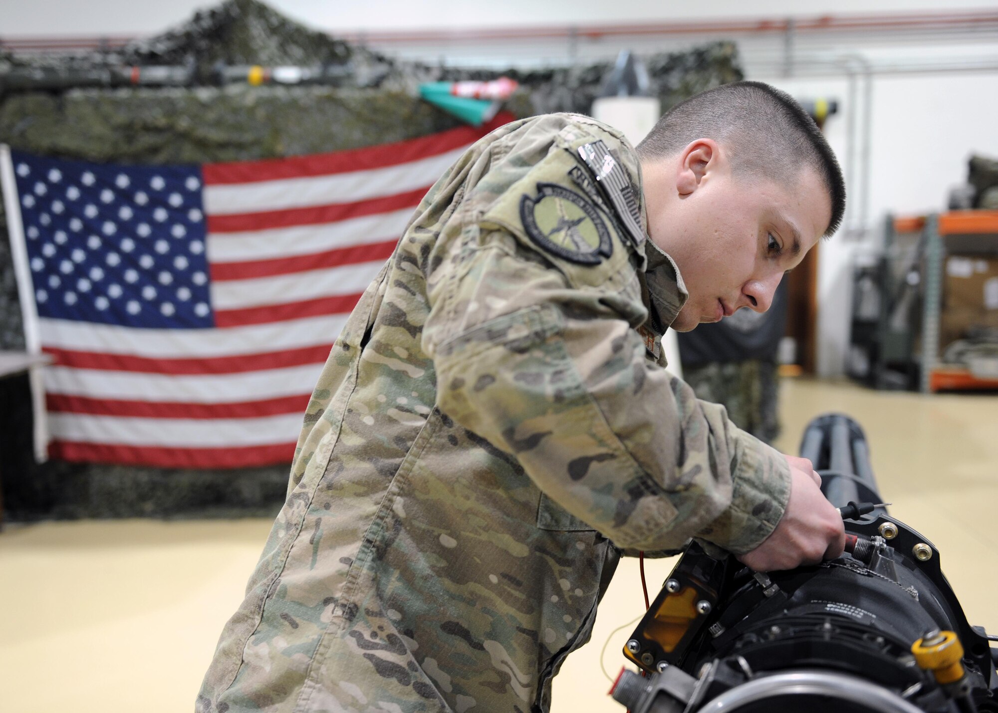 U.S. Air Force Senior Airman Aaron Alexander, 455th Expeditionary Maintenance Squadron Armament technician, performs an electrical check on an F-16 Fighting Falcon gun system March 12, 2015 at Bagram Airfield, Afghanistan. Airmen assigned to the Armament shop are charged with the responsibility of ensuring weapons systems are ready to support counterterrorism operations in Afghanistan. (U.S. Air Force photo by Staff Sgt. Whitney Amstutz/released)