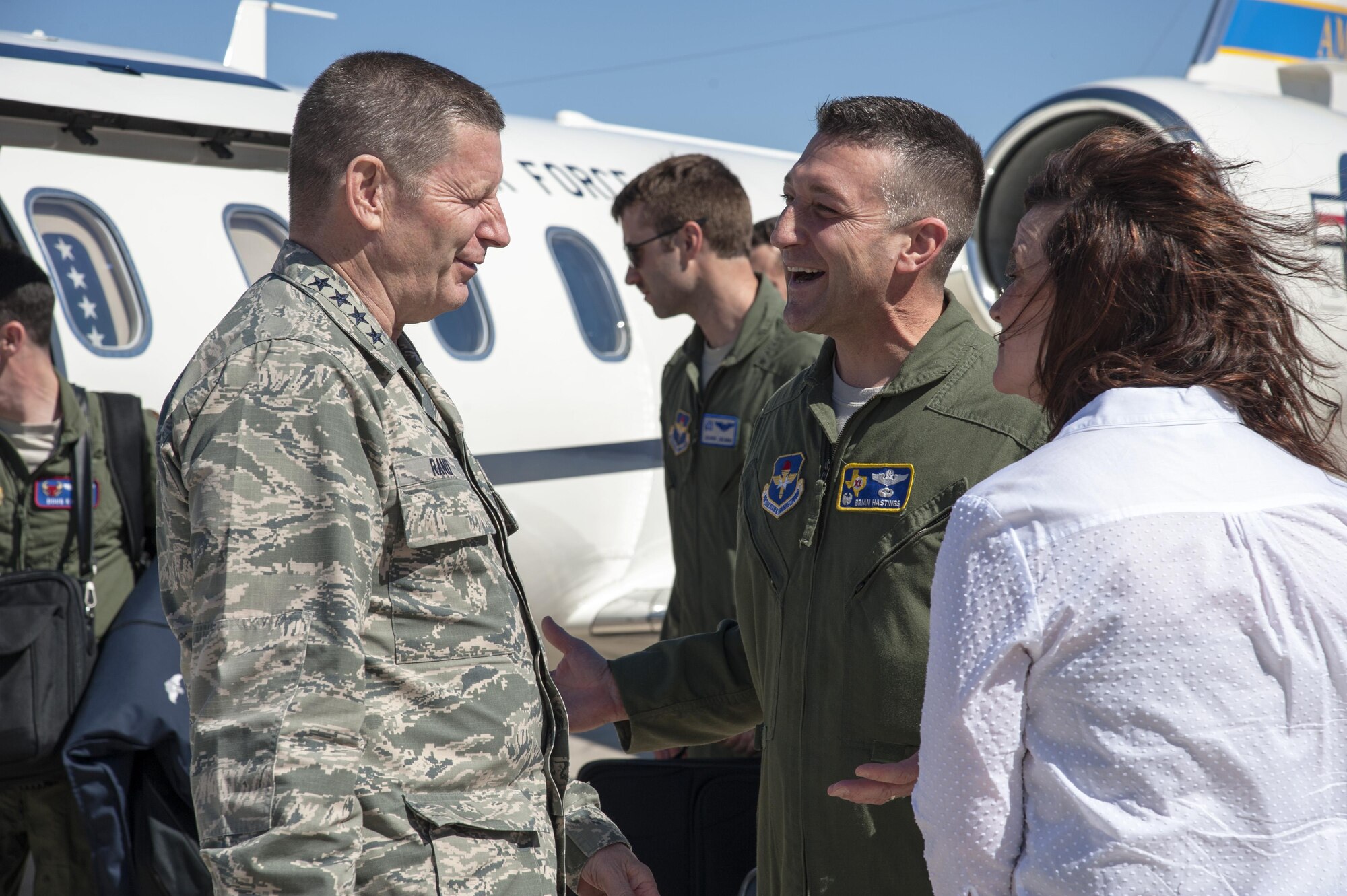 Gen. Robin Rand, commander of Air Education and Training Command, greets Col. Brian Hastings, 47th Flying Training Wing commander, and his wife, Eileen, after landing at Laughlin Air Force Base, Texas, March 12, 2015. Rand was invited to speak at the Del Rio Chamber of Commerce Annual Awards Banquet, which is a dinner event put on by the city to honor Laughlin's annual award winners. (U.S. Air Force photo by Staff Sgt. Nathan Maysonet)