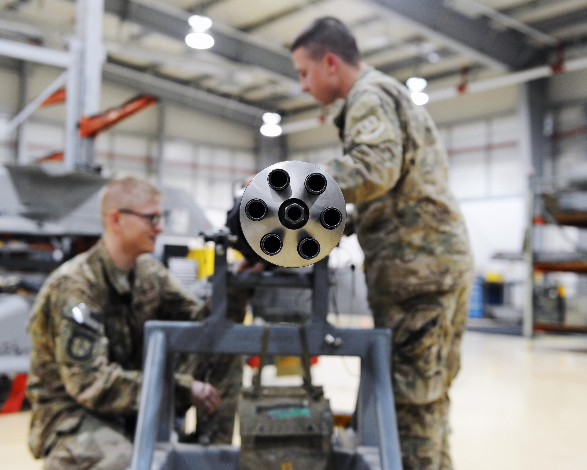 U.S. Air Force Senior Airman Aaron Alexander (right) and U.S. Air Force Staff Sgt. Damion Arendtsen, 455th Expeditionary Maintenance Squadron Armament technicians, performs an electrical check on an F-16 Fighting Falcon gun system March 12, 2015 at Bagram Airfield, Afghanistan. Airmen assigned to the Armament shop are charged with the responsibility of ensuring weapons systems are ready to support counterterrorism operations in Afghanistan. (U.S. Air Force photo by Staff Sgt. Whitney Amstutz/released)