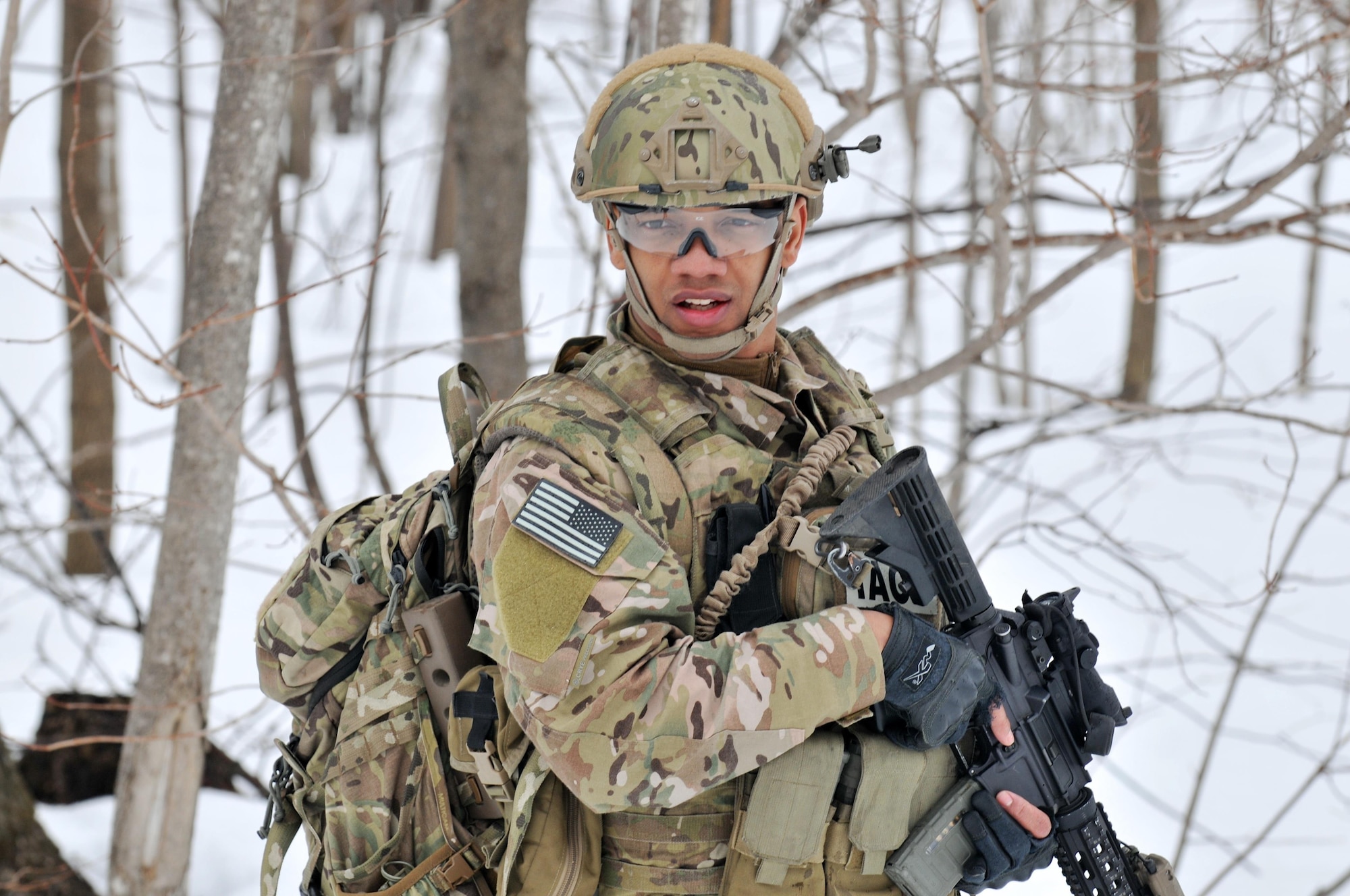 Senior Airman Joel Ramirez moves towards the objective training area during an exercise March 14, 2015, at Fort Drum, N.Y. Thirty Airmen from the New York Air National Guard’s 274th Air Support Operations Squadron (ASOS), based at Hancock Field Air National Guard Base trained on close air support (CAS) as well as training for the first time with two CH-47F Chinook helicopters from Company B, 3rd Battalion, 126th Aviation based in Rochester. The 274th mission is to advise commanders on how to best utilize U.S. and NATO assets for CAS. Ramirez is a tactical air control party (TACP) Airman. (New York Air National Guard photo/Master Sgt. Eric Miller)