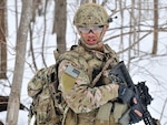 Senior Airman Joel Ramirez,a Tactical Air Control Party (TACP) Airman, moves towards the objective training area during an exercise at Fort Drum, N.Y., March 14, 2015. Thirty Airmen from the New York Air National Guard’s 274th Air Support Operations Squadron (ASOS), based at Hancock Field Air National Guard Base trained on Close Air Support (CAS) as well as training for the first time with two CH-47F Chinook helicopters from Company B, 3rd Battalion, 126th Aviation based in Rochester, N.Y.