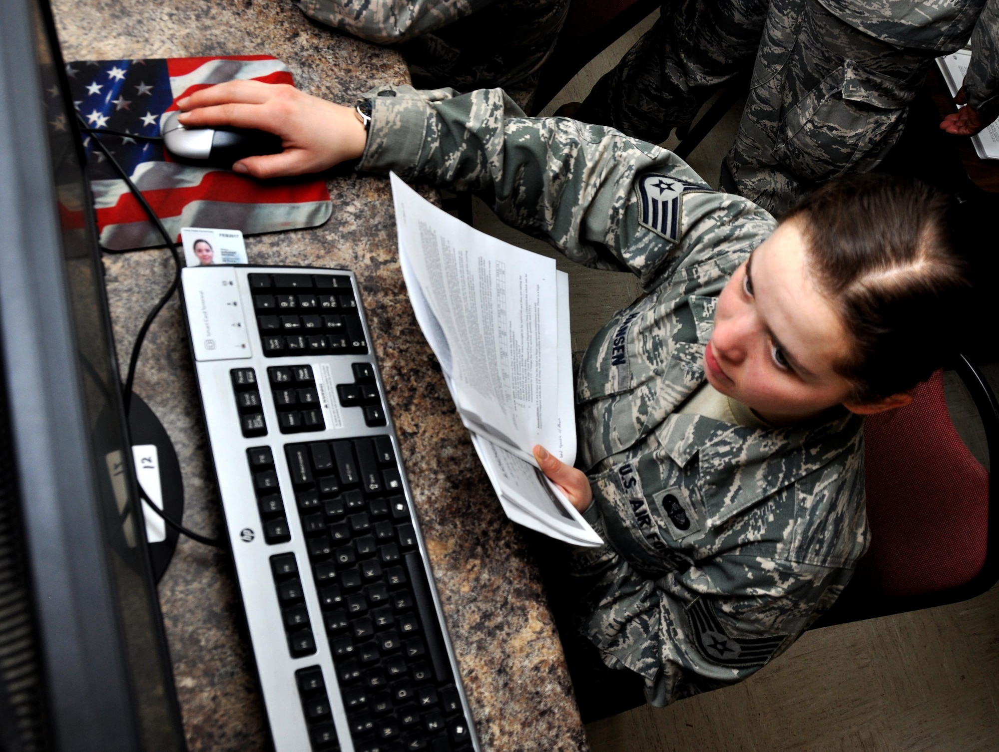 Staff Sgt. Kelsey Ansen, 911th Force Support Squadron, Pittsburgh, Pa., researches plans on how to build a bare base from scratch during a table top deployment scenario for Force Support Silver Flag at Dobbins Air Reserve Base, Ga., March 10, 2015. The challenge consisted of teams competing against each other in nine different events ranging from following a convoy, building tents, fixing Babington burners, cooking meals, planning lodging, planning a base from scratch, driving a forklift and a scavenger hunt. (U.S. Air Force photo/Senior Airman Daniel Phelps)
