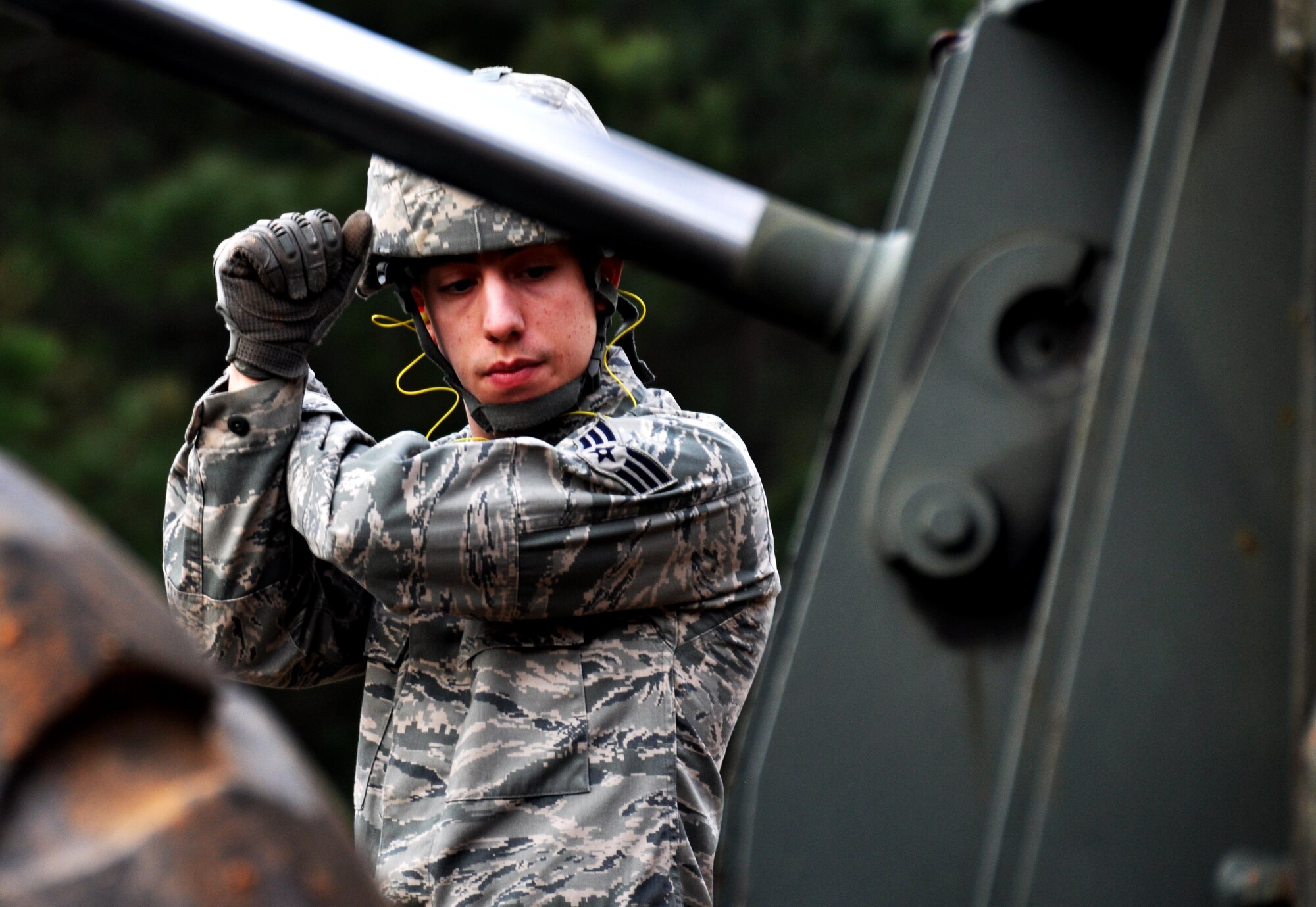 Senior Airmen Tyler Wright, 911th Force Support Squadron, Pittsburgh, Pa., guides Master Sgt. Mark Ansani, 911th FSS, as he drives a forklift during Force Support Silver Flag at Dobbins Air Reserve Base, Georgia, March 11, 2015. About 70 Airmen on teams from Peterson Air Force Base, Colorado; the 445th FSS from Wright-Patterson Air Force Base, Ohio; the 908th FSS from Maxwell AFB, Alabama; the 910th FSS from Youngstown ARB, Ohio; the 911th FSS from Pittsburgh, Pennsylvania; and the 934th FSS from Minneapolis – St. Paul, Minnesota competed in FS Silver Flag. (U.S. Air Force photo/Senior Airman Daniel Phelps)