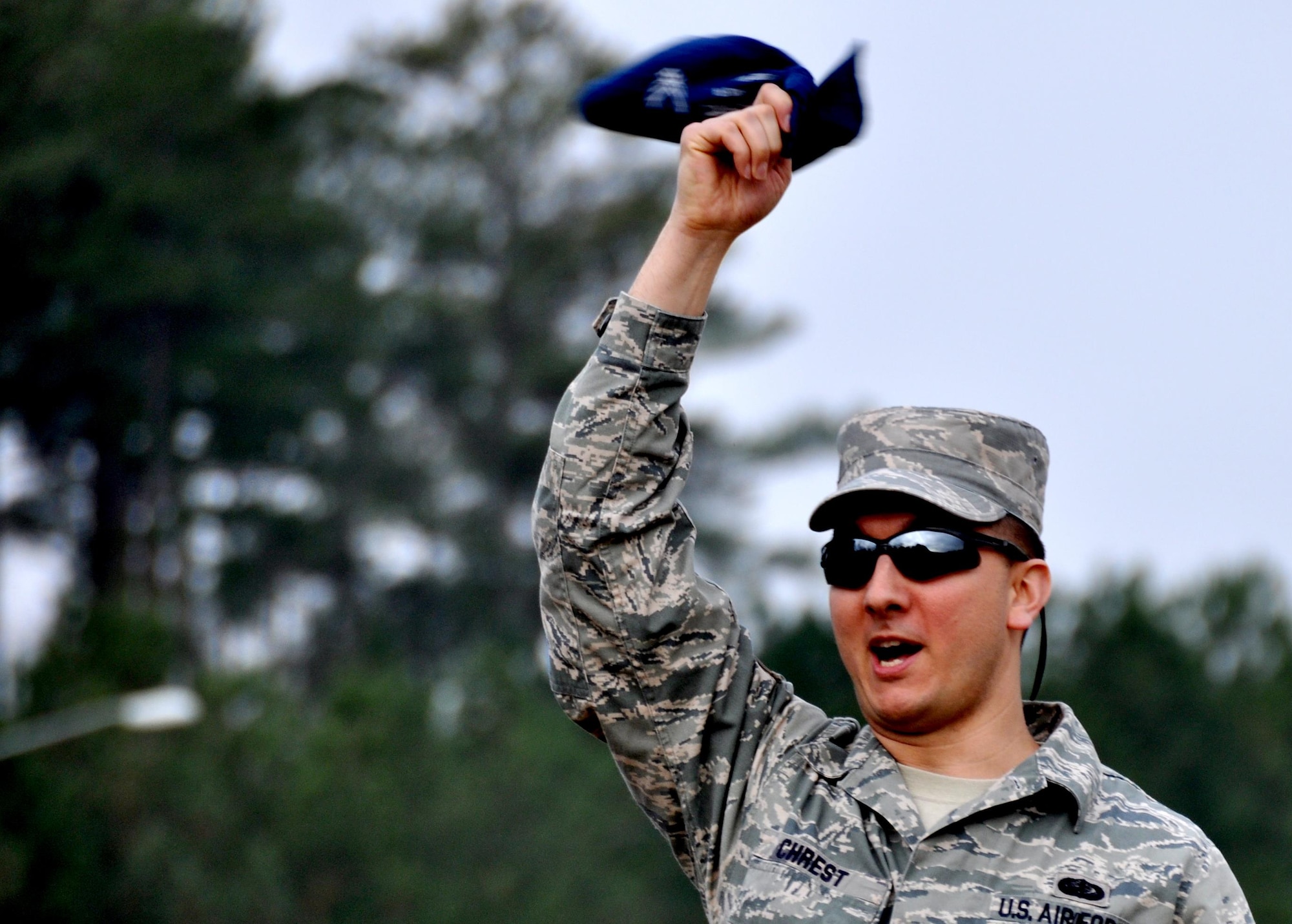 Staff Sgt. Daniel Chrest, 911th Force Support Squadron, Pittsburgh, Pa., cheers for his team mates as they compete in the forklift portion of the Readiness Challenge for Force Support Silver Flag at Dobbins Air Reserve Base, Georgia, March 11, 2015. The challenge consisted of teams competing against each other in nine different events ranging from following a convoy, building tents, fixing Babington burners, cooking meals, planning lodging, planning a base from scratch, driving a forklift and a scavenger hunt. (U.S. Air Force photo/Senior Airman Daniel Phelps)