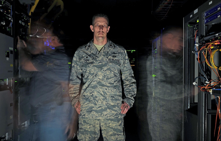 Maj. Billy Pope Jr., 81st Communications Squadron commander, poses for a photo in the base’s server room at Keesler Air Force Base, Mississippi, March 9, 2015, . Pope took command of the 81st CS in June 2014.This is his first assignment as a commander. (U.S. Air Force photo by Airman 1st Class Duncan McElroy)