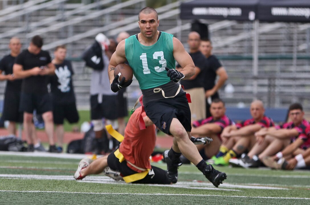 Marine Corps Community Services held the Commanding General’s Cup Flag Football tournament at the Paige Fieldhouse here, March 18. 44 teams participated in the tournament, which was held in a Shootout, single elimination format. The 11th Marine Expeditionary Unit team took home first place, with Marine Corps Base Camp Pendleton, Alpha Company, coming in second.